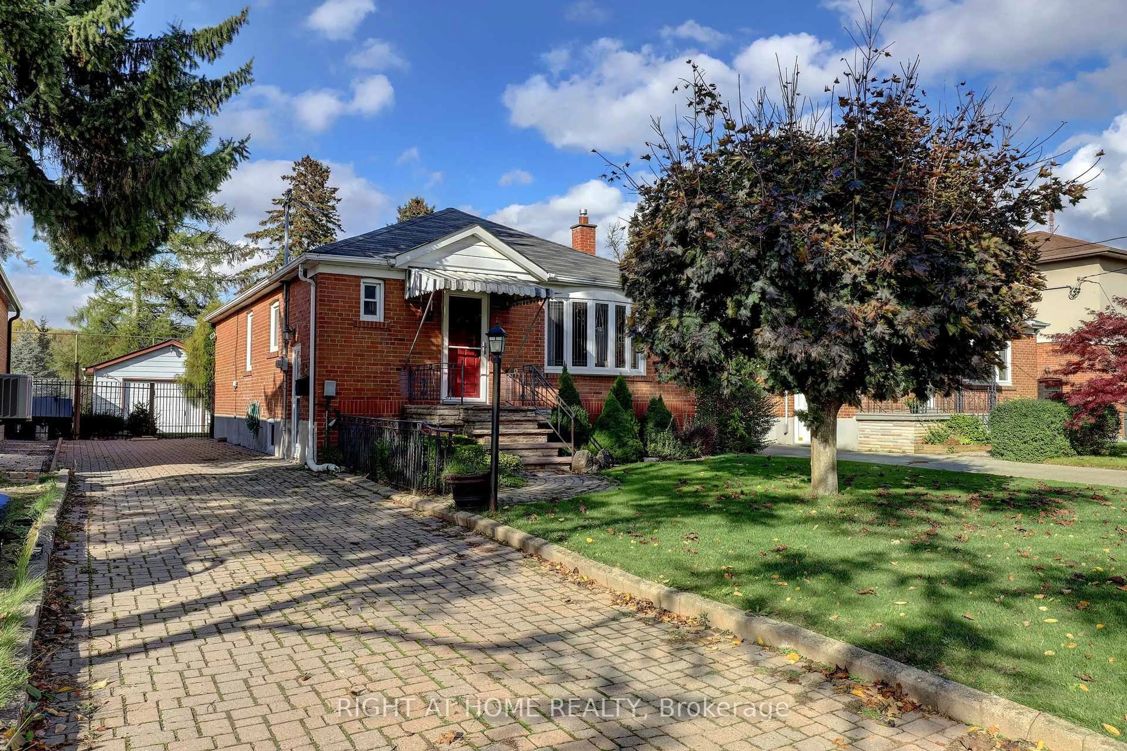Home with brick exterior material, street for 56 Cynthia Rd, Toronto Ontario M6N 2P9