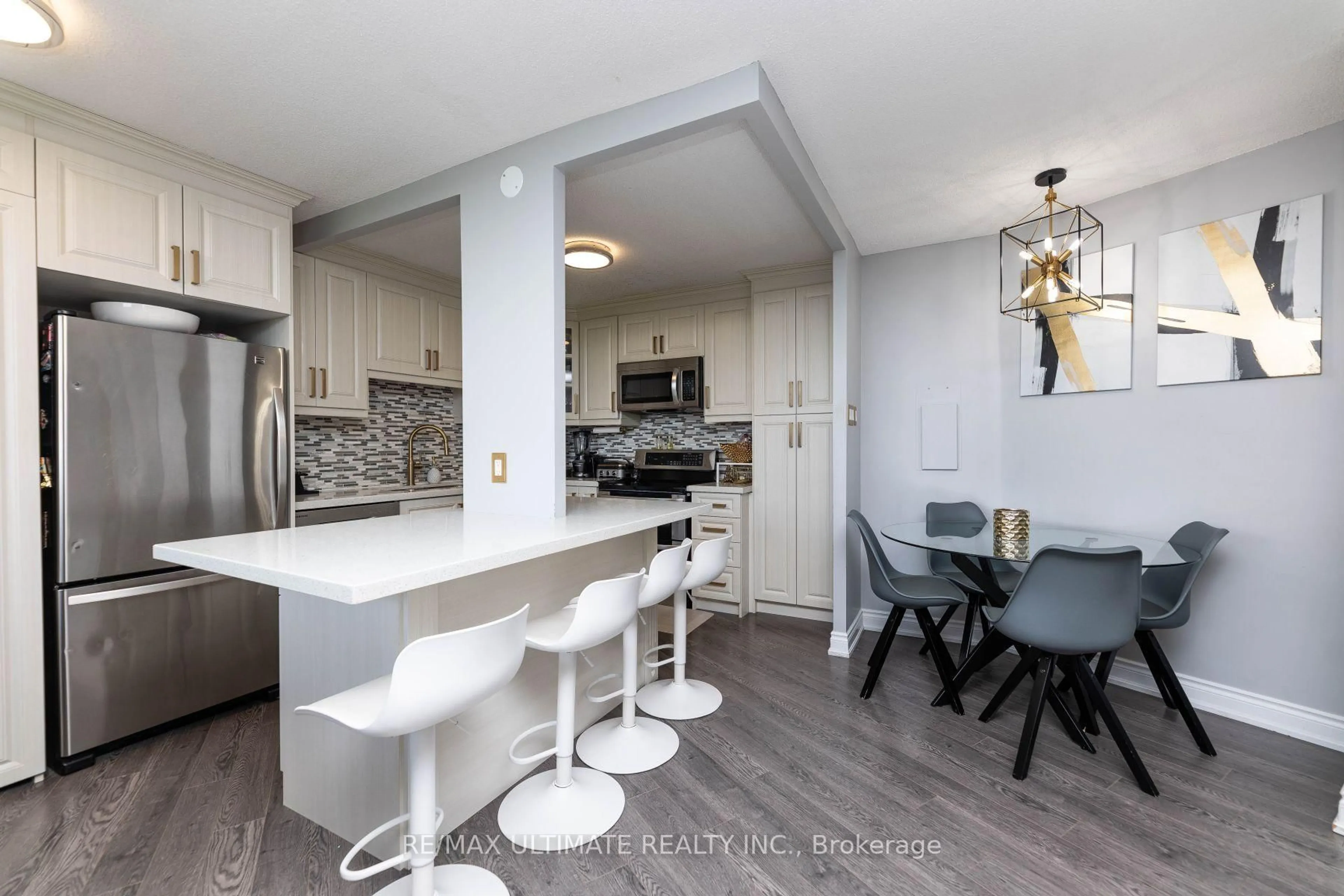 Open concept kitchen, unknown for 530 Lolita Garden #1007, Mississauga Ontario L5A 3T2