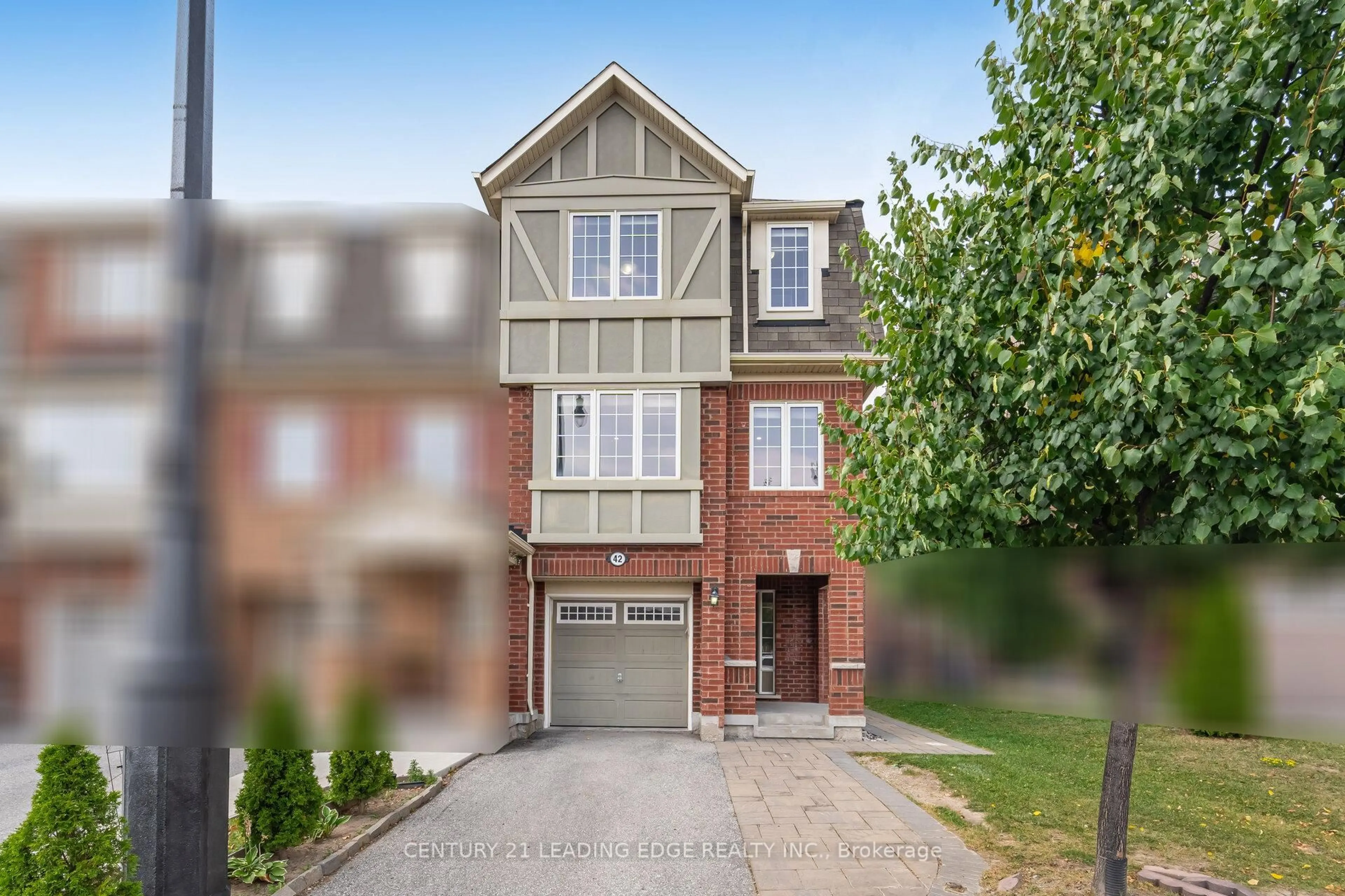 Home with brick exterior material, street for 42 Memory Lane, Brampton Ontario L7A 0V9