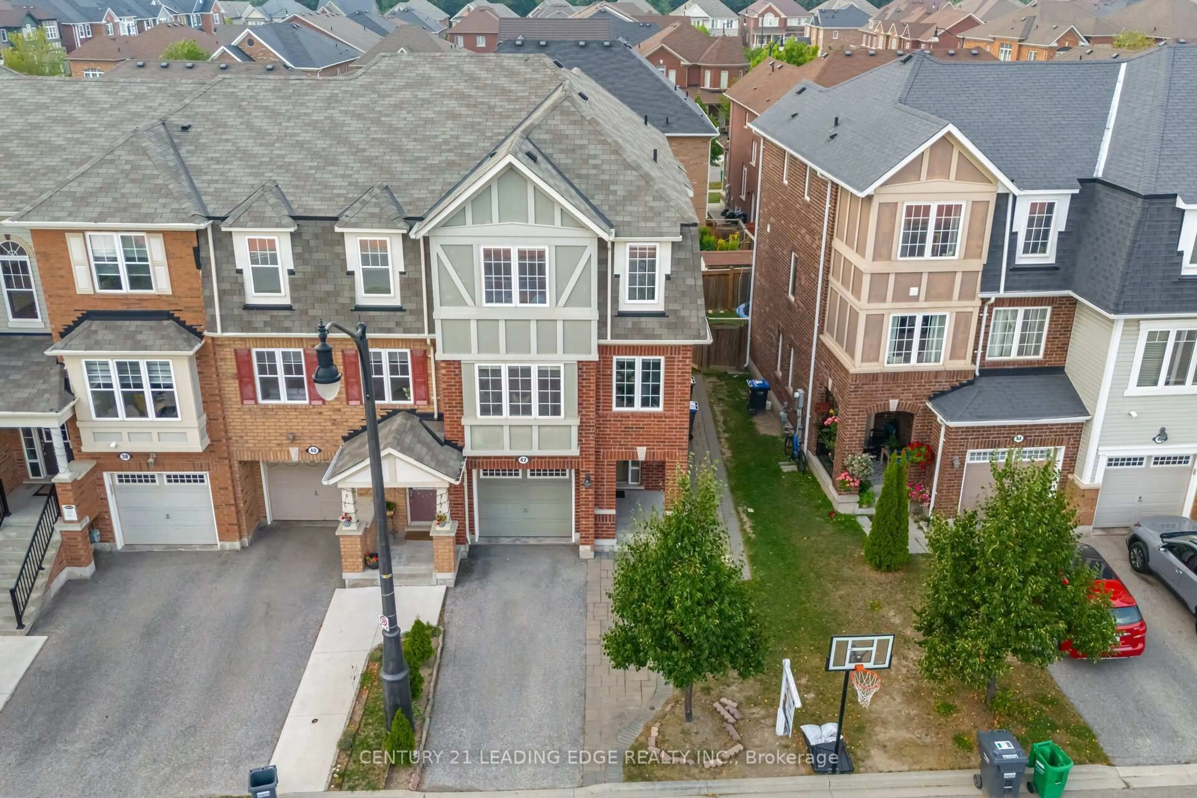 A pic from outside/outdoor area/front of a property/back of a property/a pic from drone, street for 42 Memory Lane, Brampton Ontario L7A 0V9