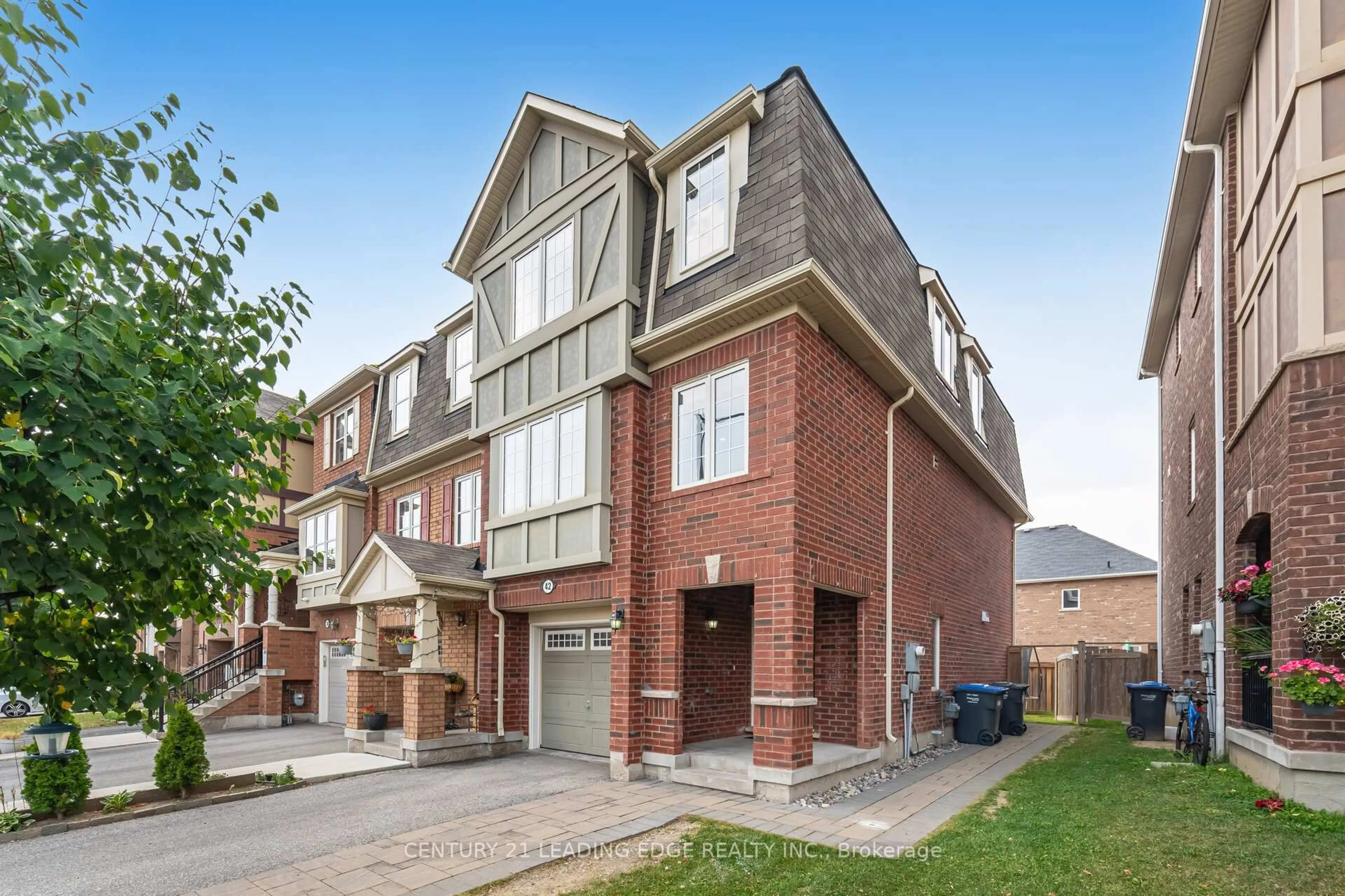 Home with brick exterior material, street for 42 Memory Lane, Brampton Ontario L7A 0V9