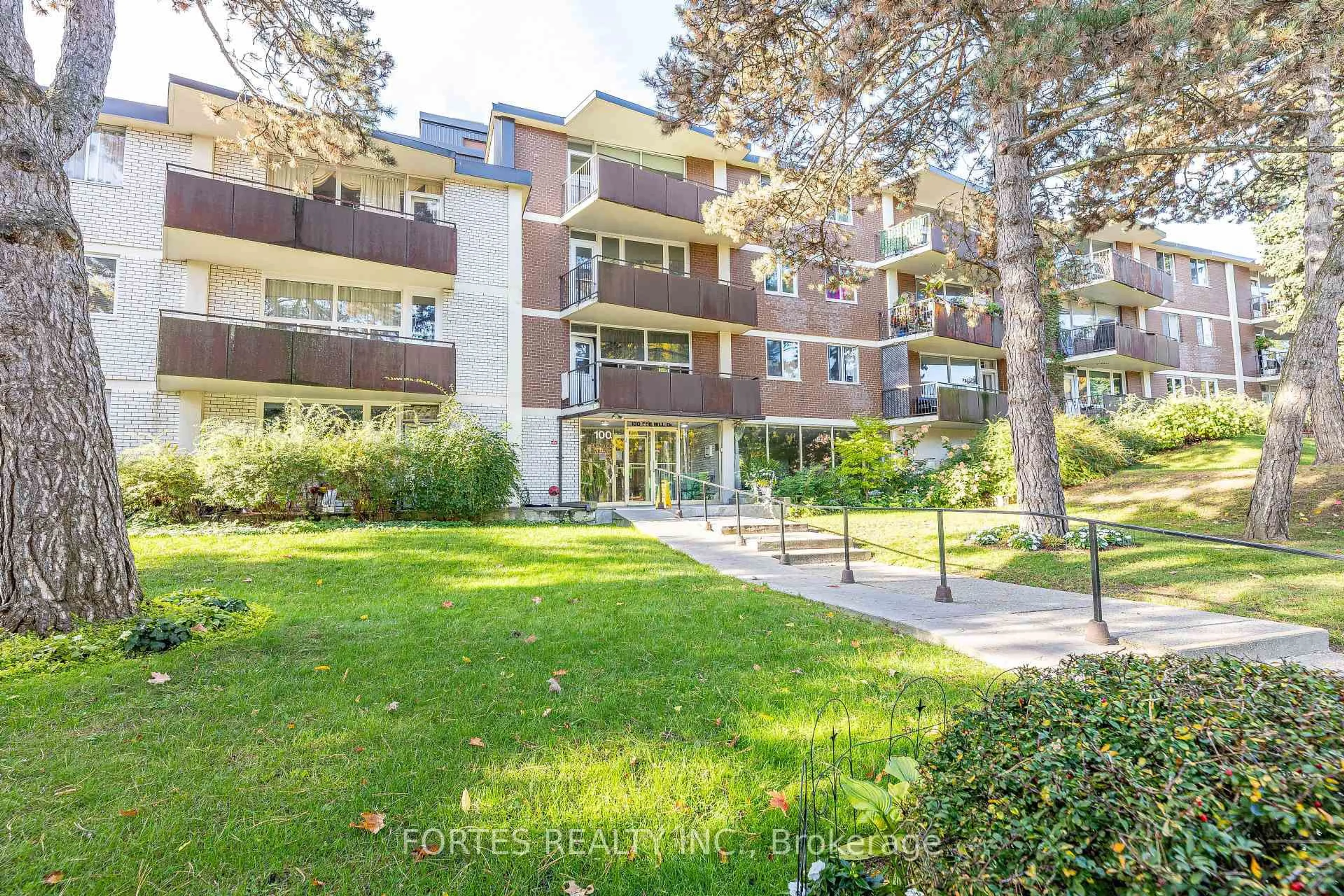 A pic from outside/outdoor area/front of a property/back of a property/a pic from drone, unknown for 100 Coe Hill Dr #102, Toronto Ontario M6S 3E1