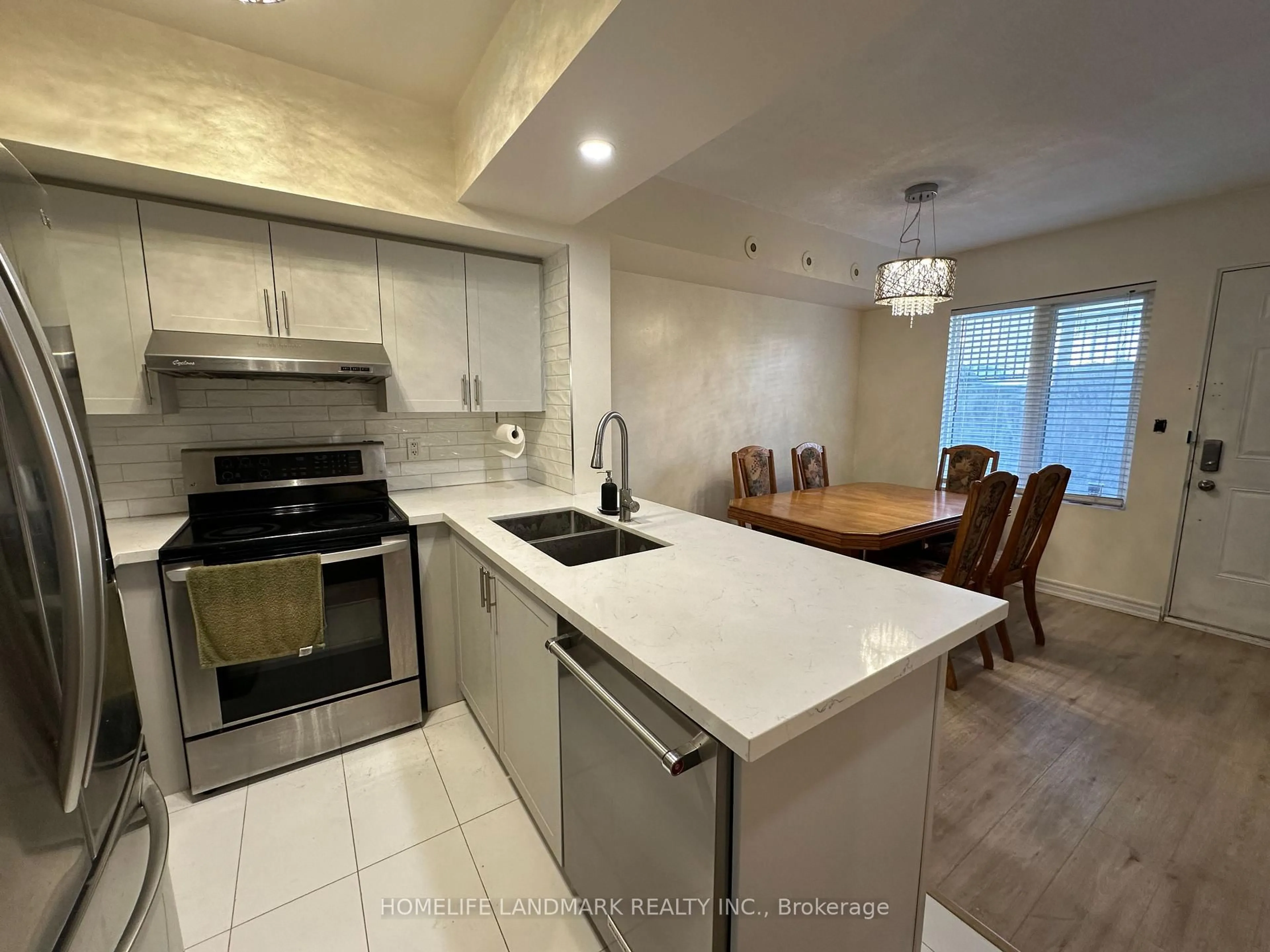 Open concept kitchen, ceramic/tile floor for 3043 Finch Ave #1014, Toronto Ontario M9M 0A4