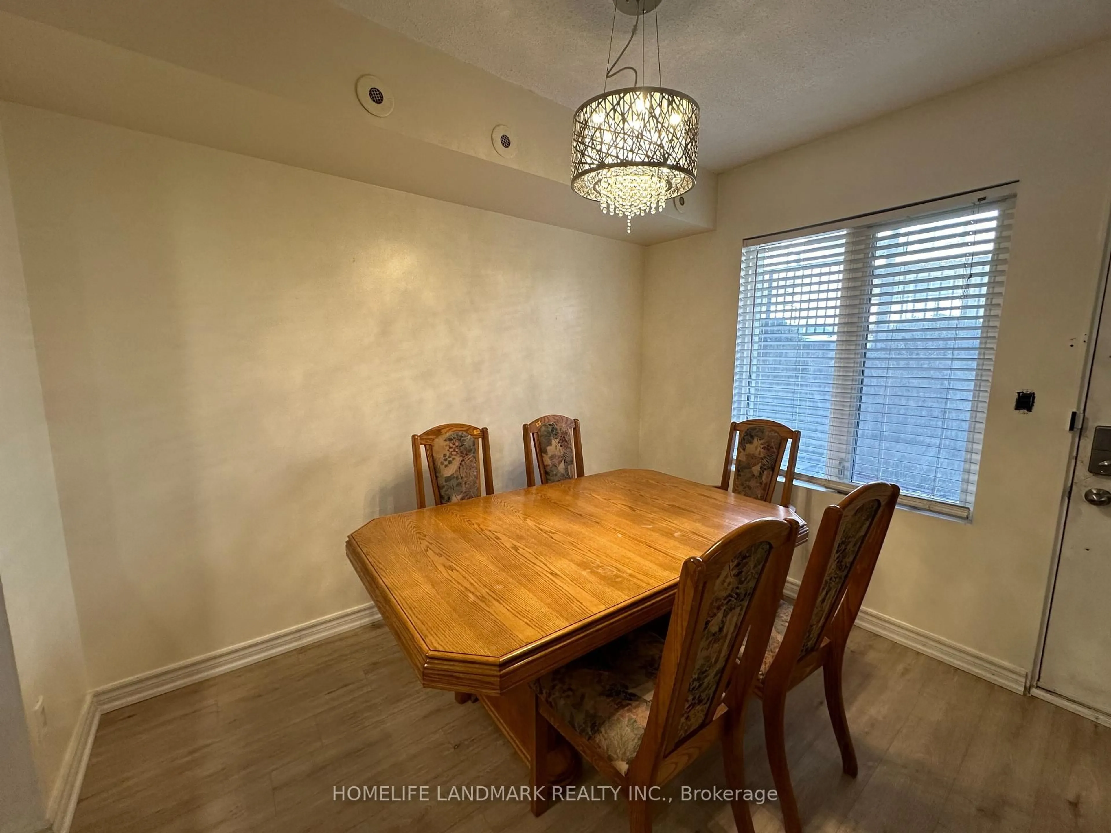 Dining room, wood/laminate floor for 3043 Finch Ave #1014, Toronto Ontario M9M 0A4