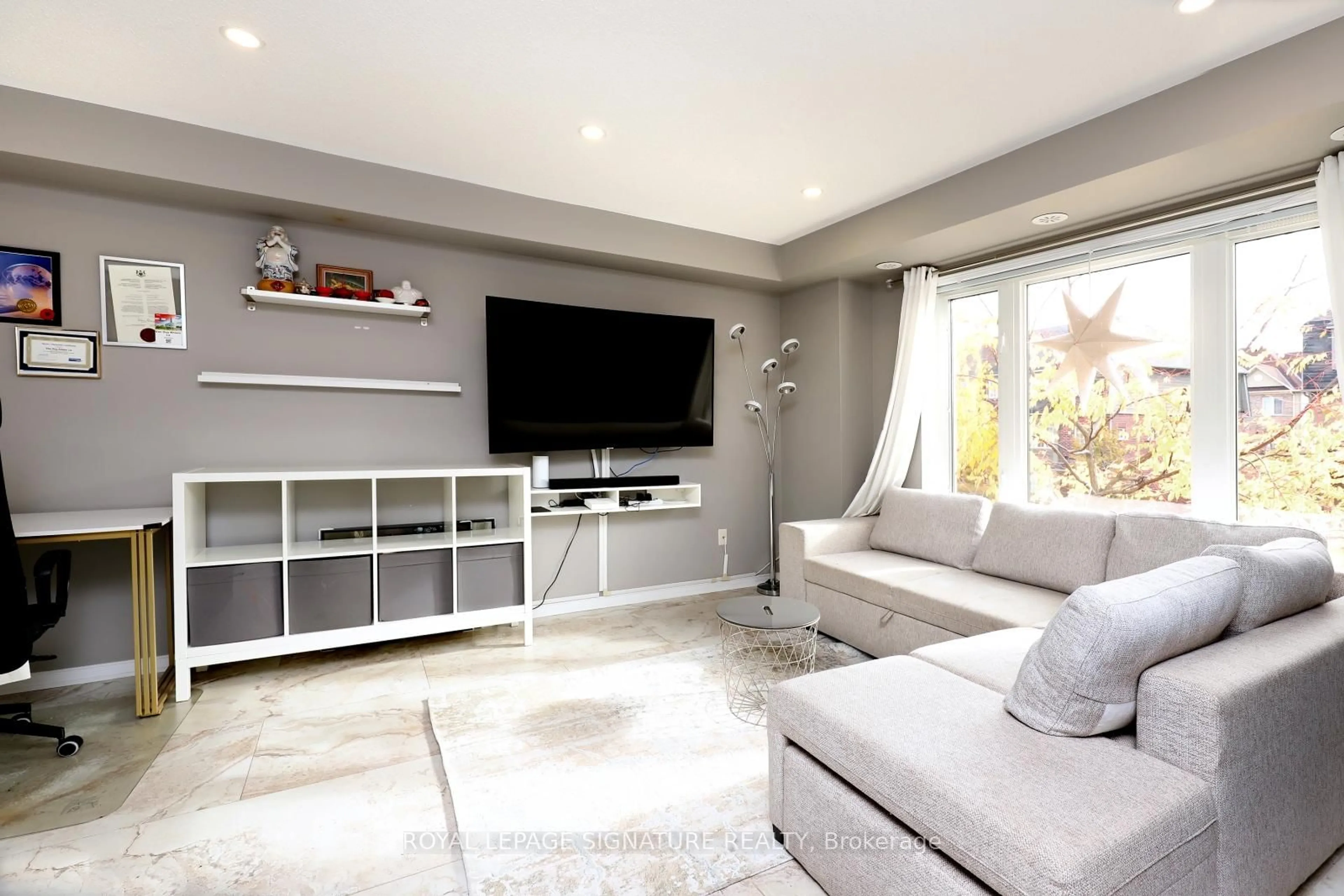 Living room with furniture, ceramic/tile floor for 3025 Destination Dr #9, Mississauga Ontario L5M 0P3