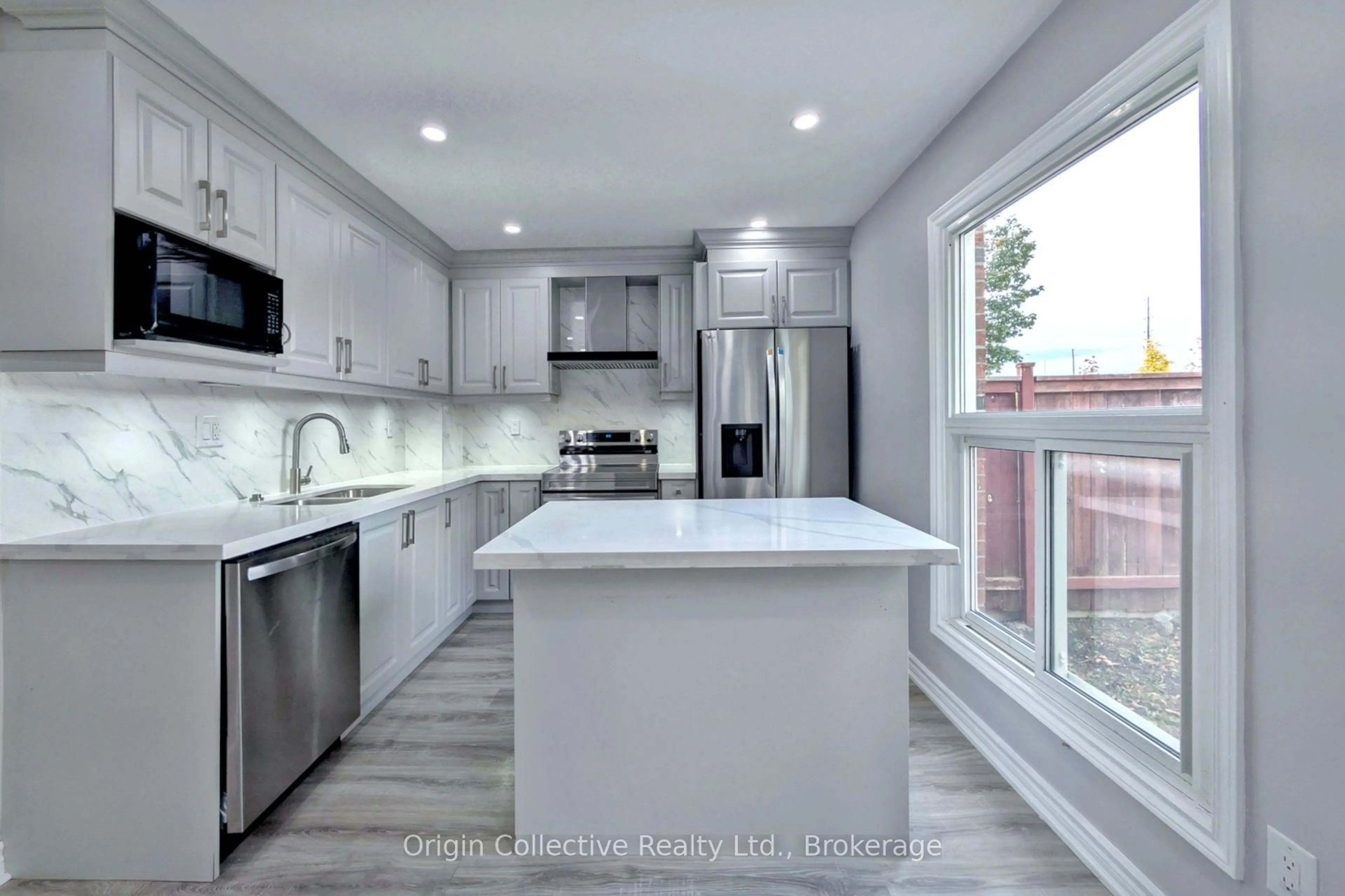 Open concept kitchen, ceramic/tile floor for 47 Woolenscote Circ, Toronto Ontario M9V 4R6