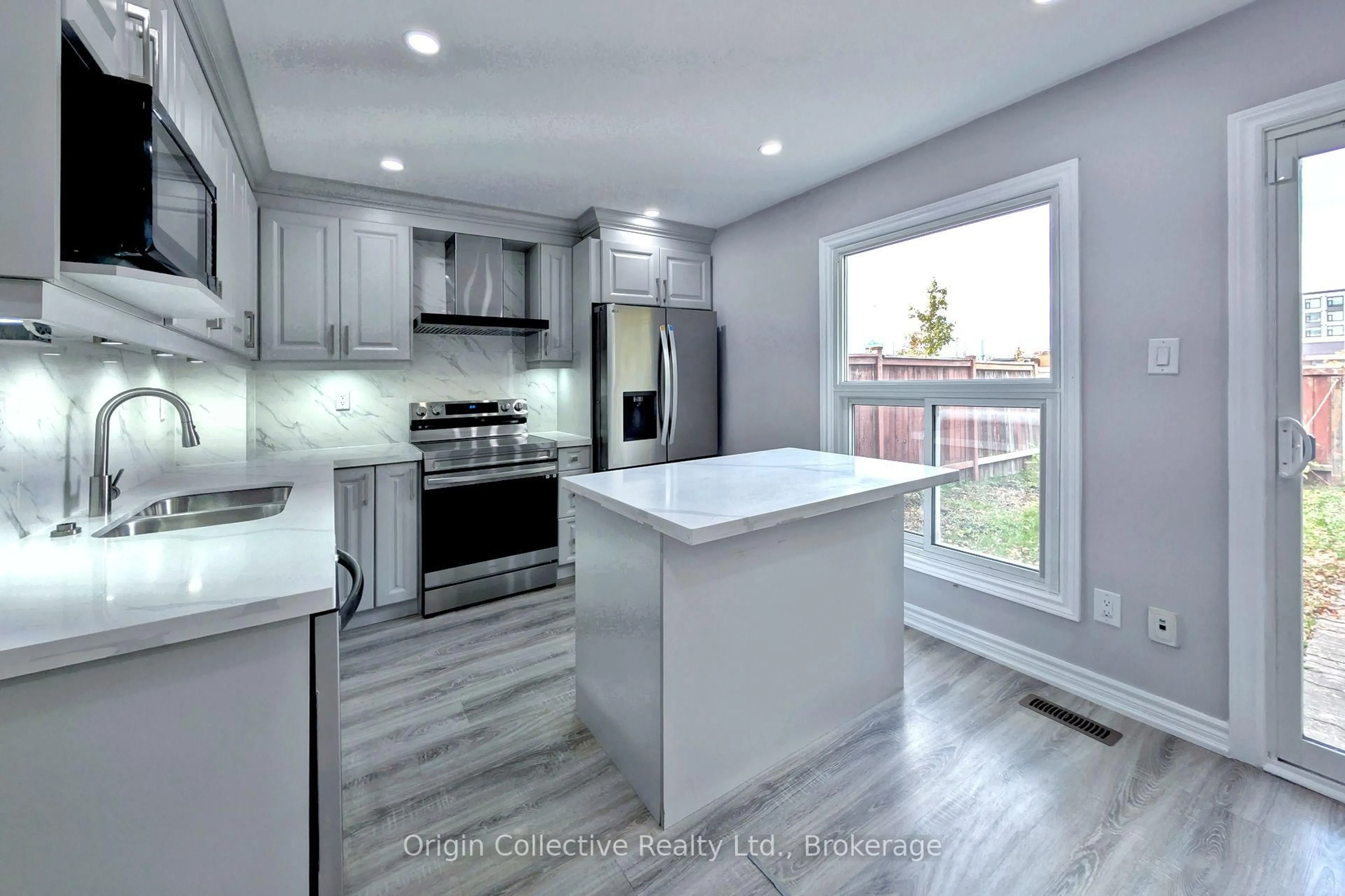 Open concept kitchen, unknown for 47 Woolenscote Circ, Toronto Ontario M9V 4R6