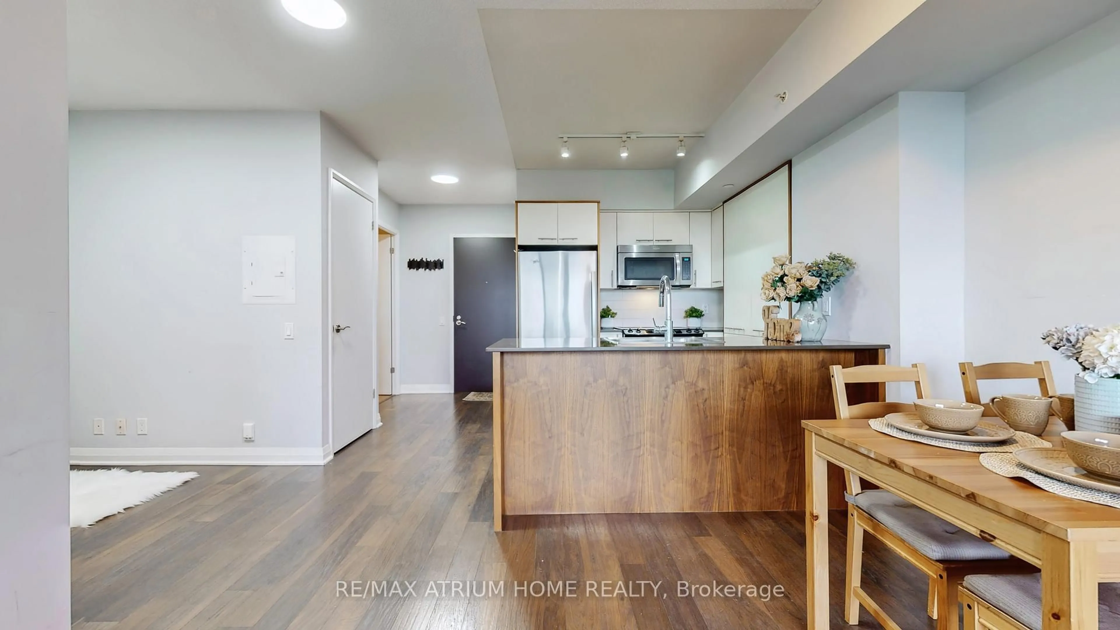 Open concept kitchen, wood/laminate floor for 5 Valhalla Inn Rd #1803, Toronto Ontario M9B 0B1