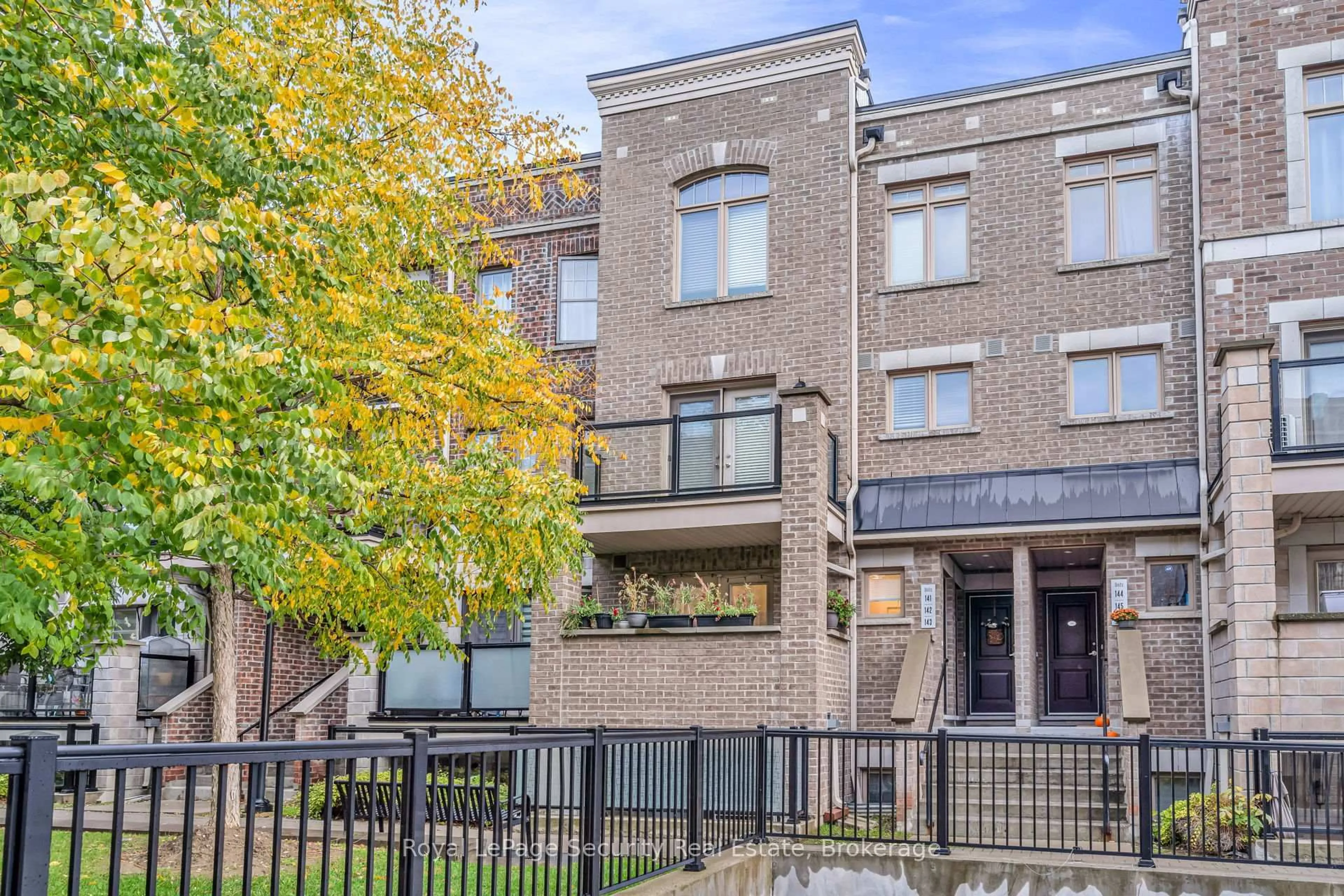 Home with brick exterior material, street for 80 Parrotta Dr #141, Toronto Ontario M9M 0E6