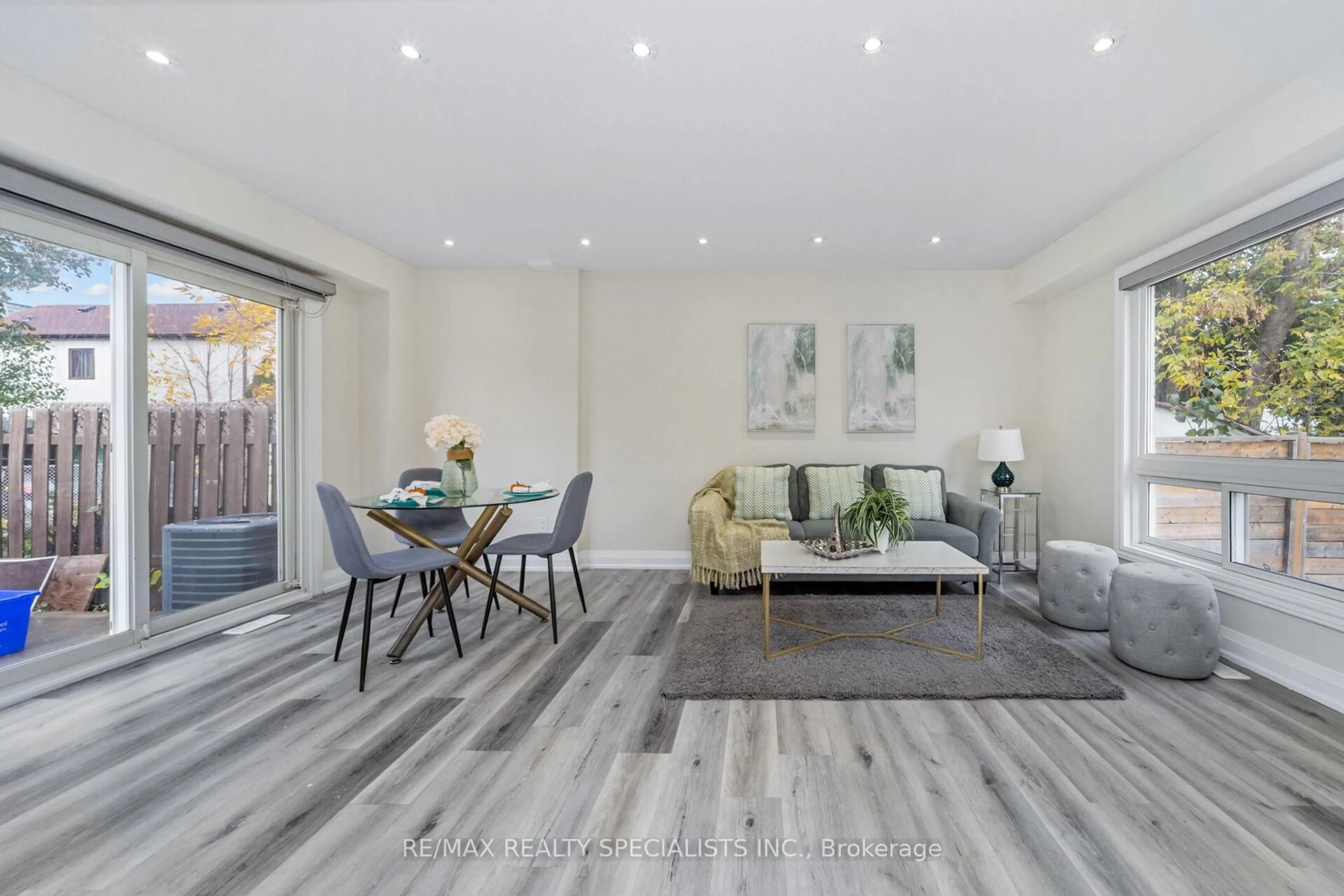 Living room with furniture, wood/laminate floor for 1 Golden Gate Dr, Brampton Ontario L6S 2K5