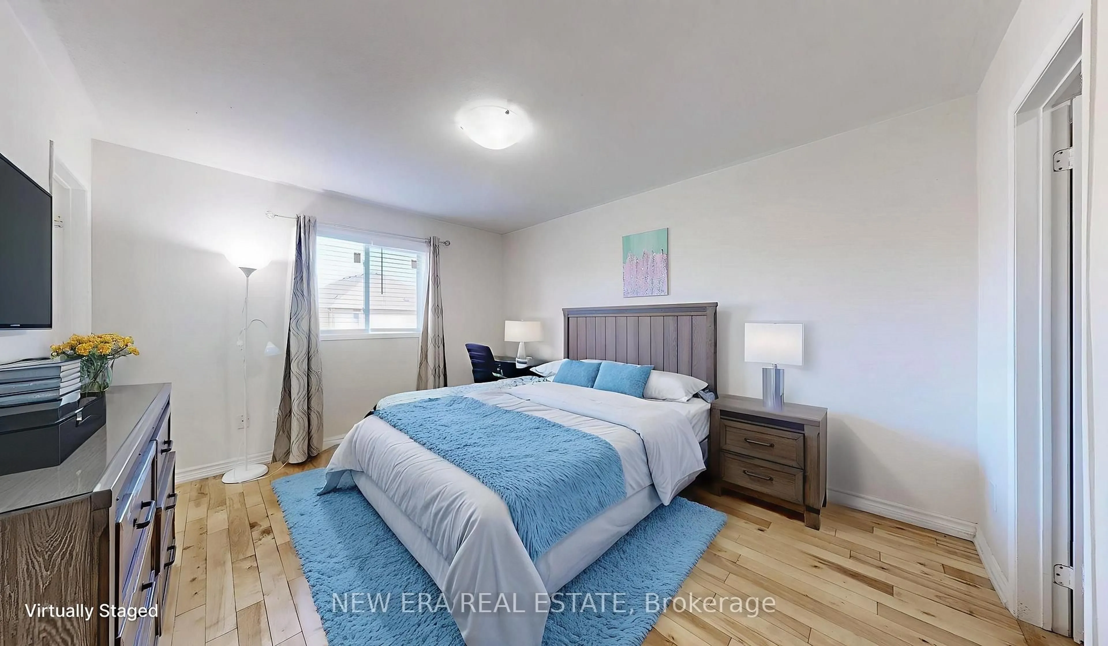 Bedroom with bed, wood/laminate floor for 624 Rossellini Dr, Mississauga Ontario L5W 1M3