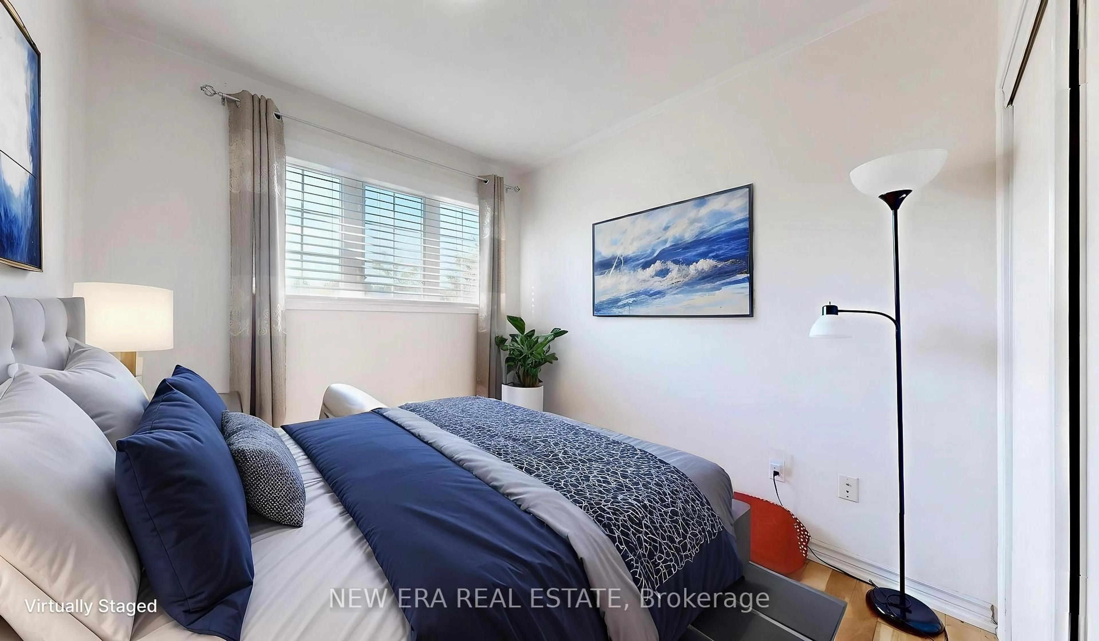 Bedroom with bed, wood/laminate floor for 624 Rossellini Dr, Mississauga Ontario L5W 1M3