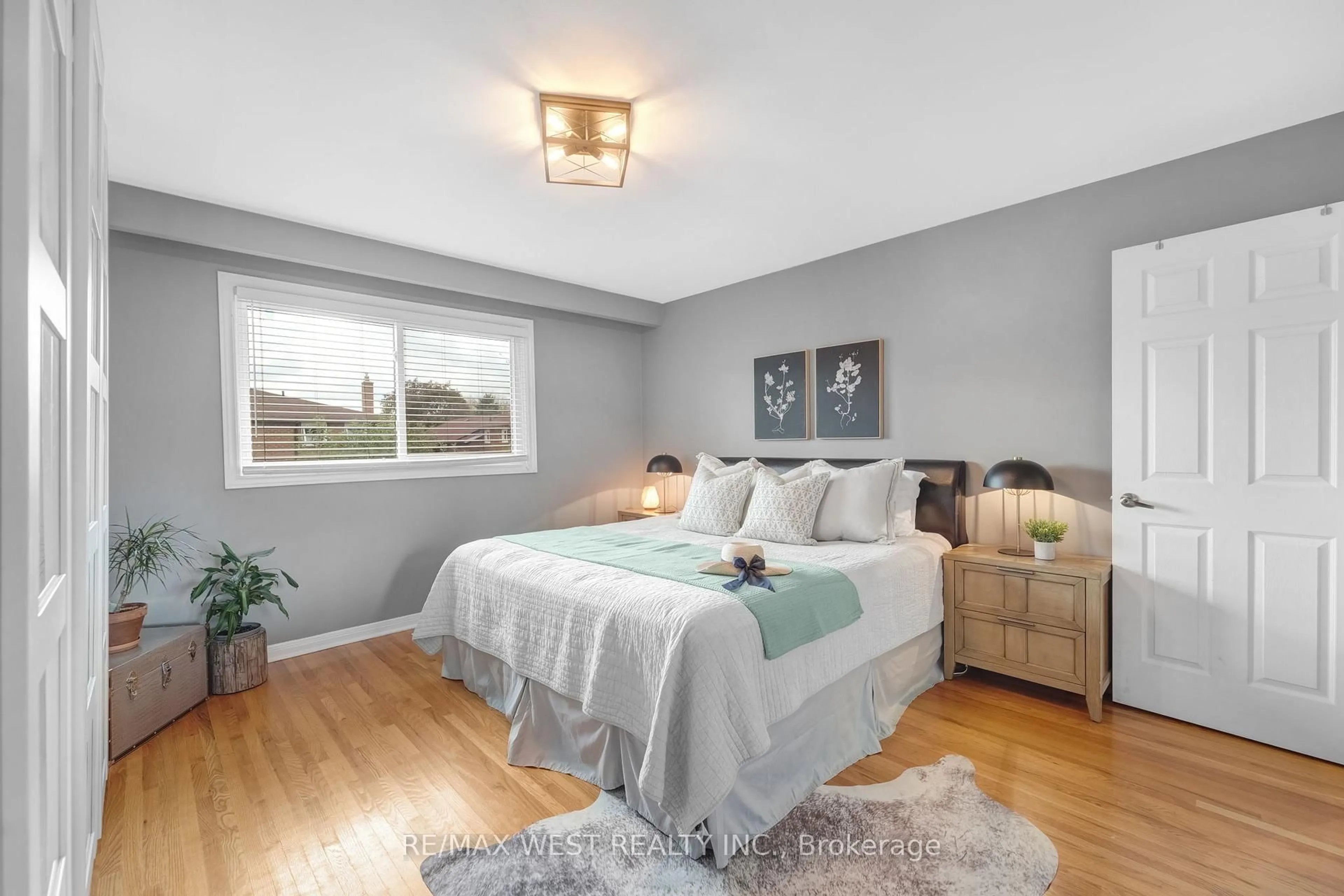 Bedroom with bed, wood/laminate floor for 2388 Carlanne Pl, Mississauga Ontario L5C 3C8