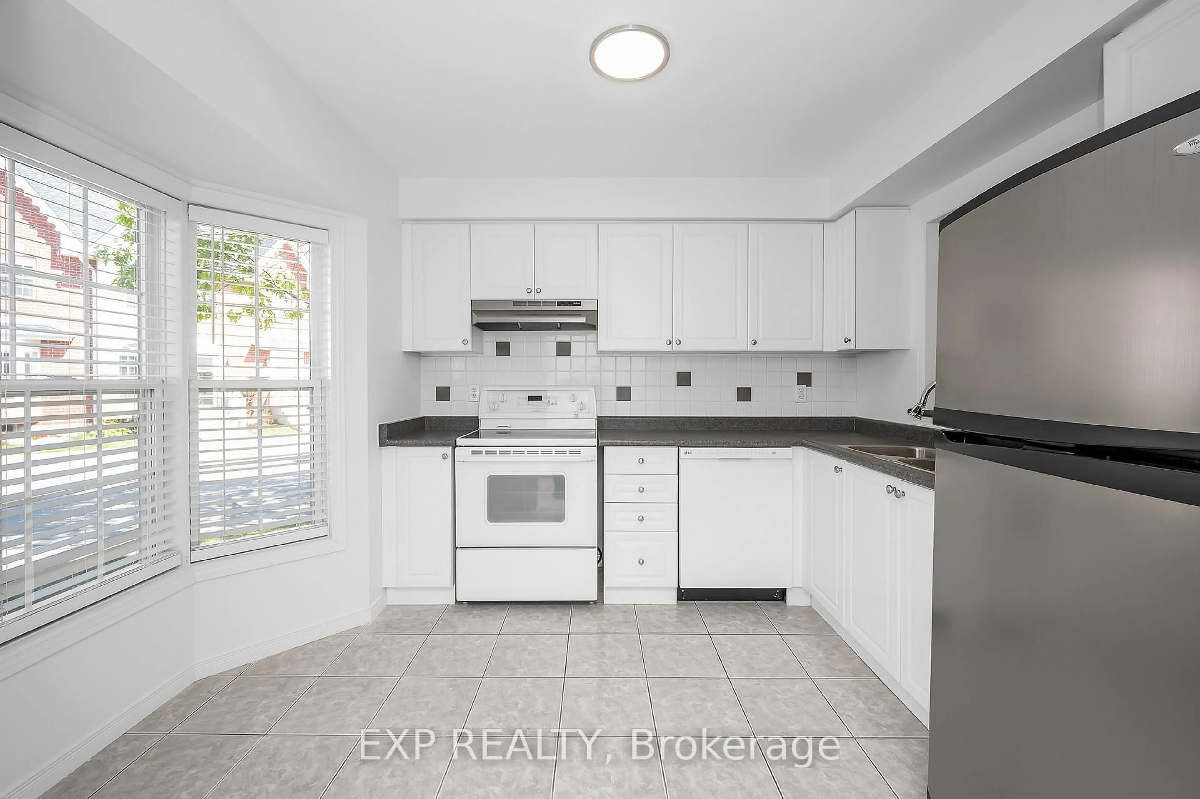 Standard kitchen, ceramic/tile floor for 4200 Kilmer Dr #64, Burlington Ontario L7M 4Y3