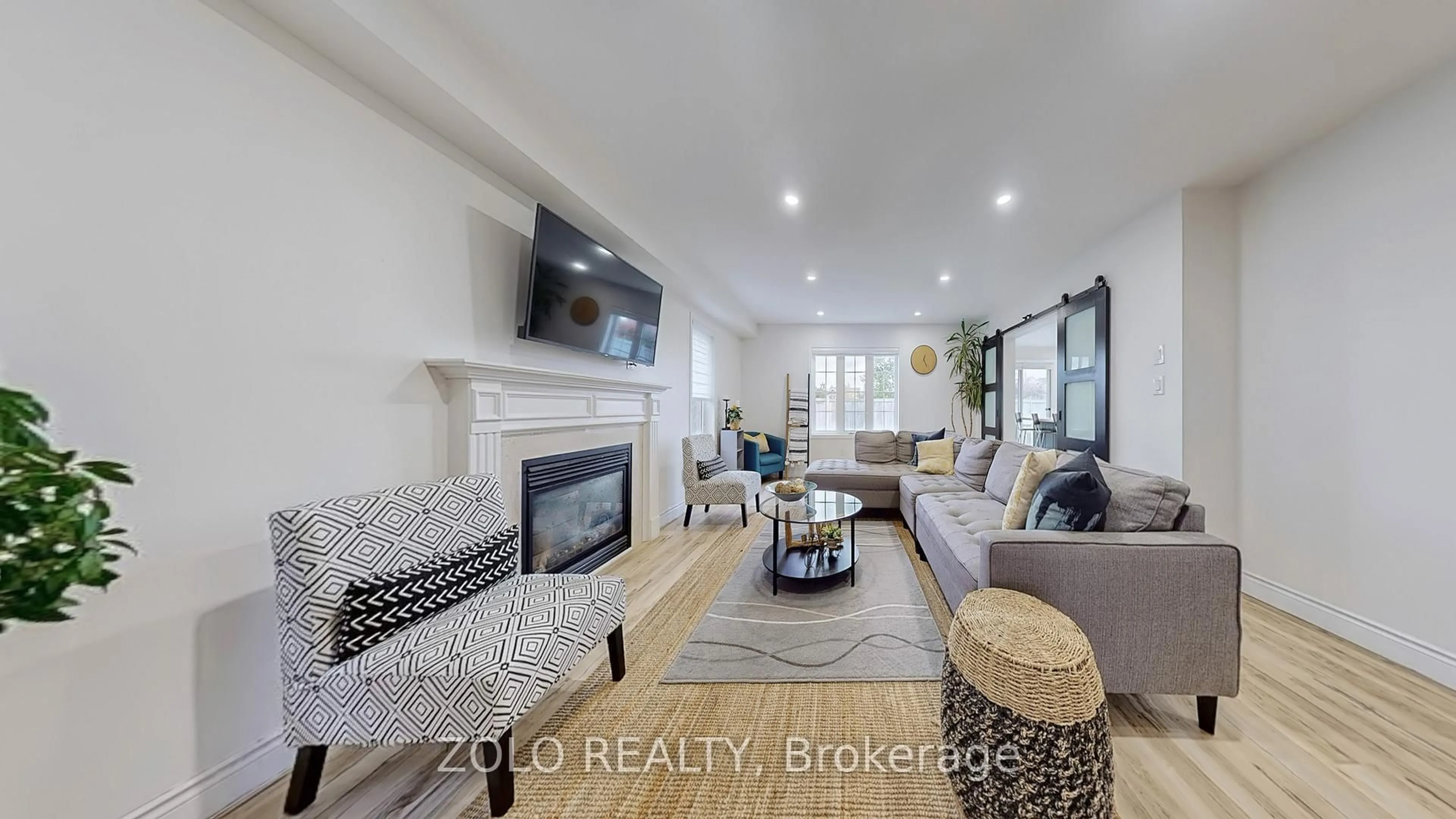 Living room with furniture, ceramic/tile floor for 21 River Heights Dr, Brampton Ontario L6P 2M9