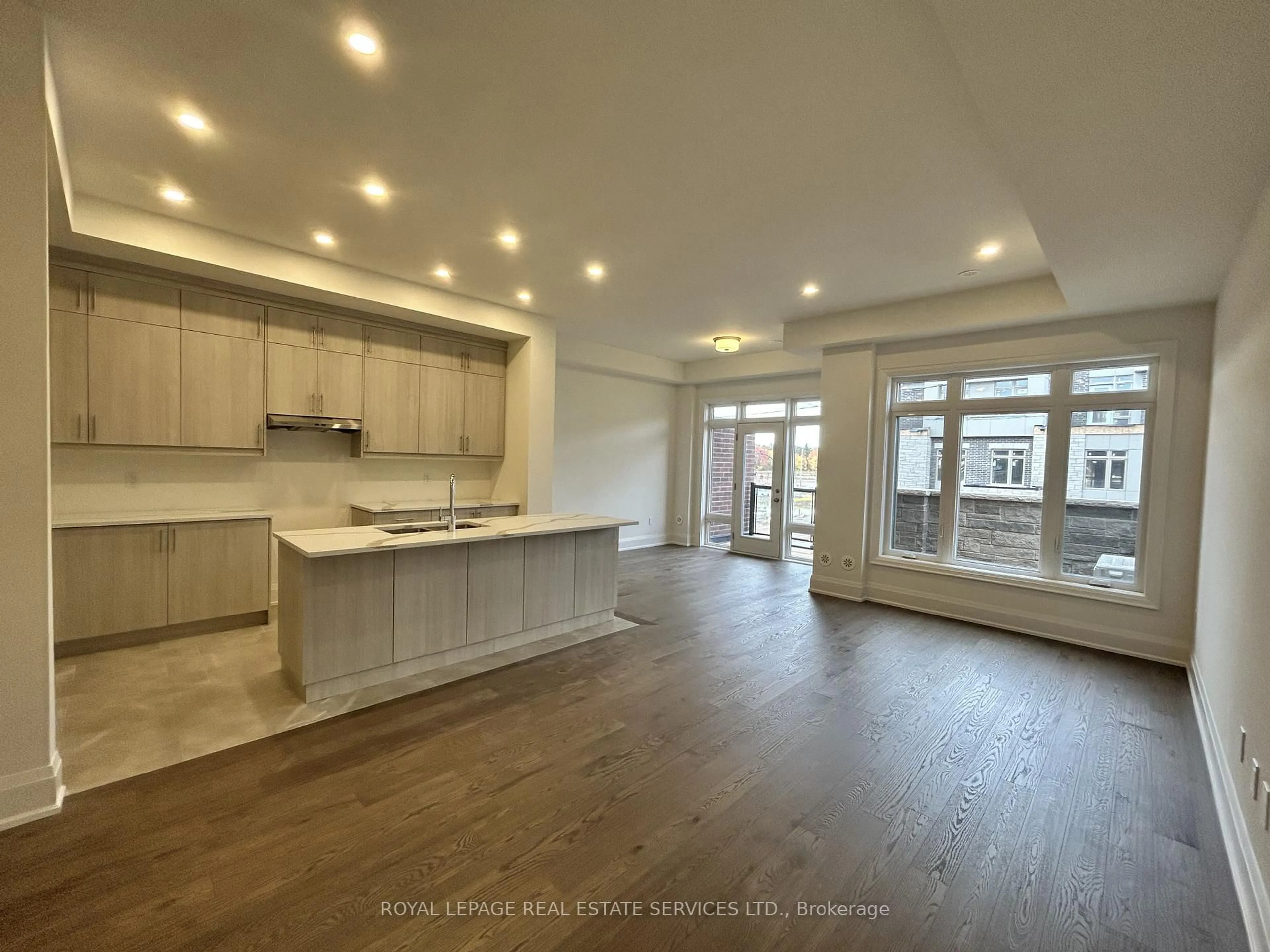 Open concept kitchen, wood/laminate floor for 3303 Taha Gdns, Oakville Ontario L6M 5R9
