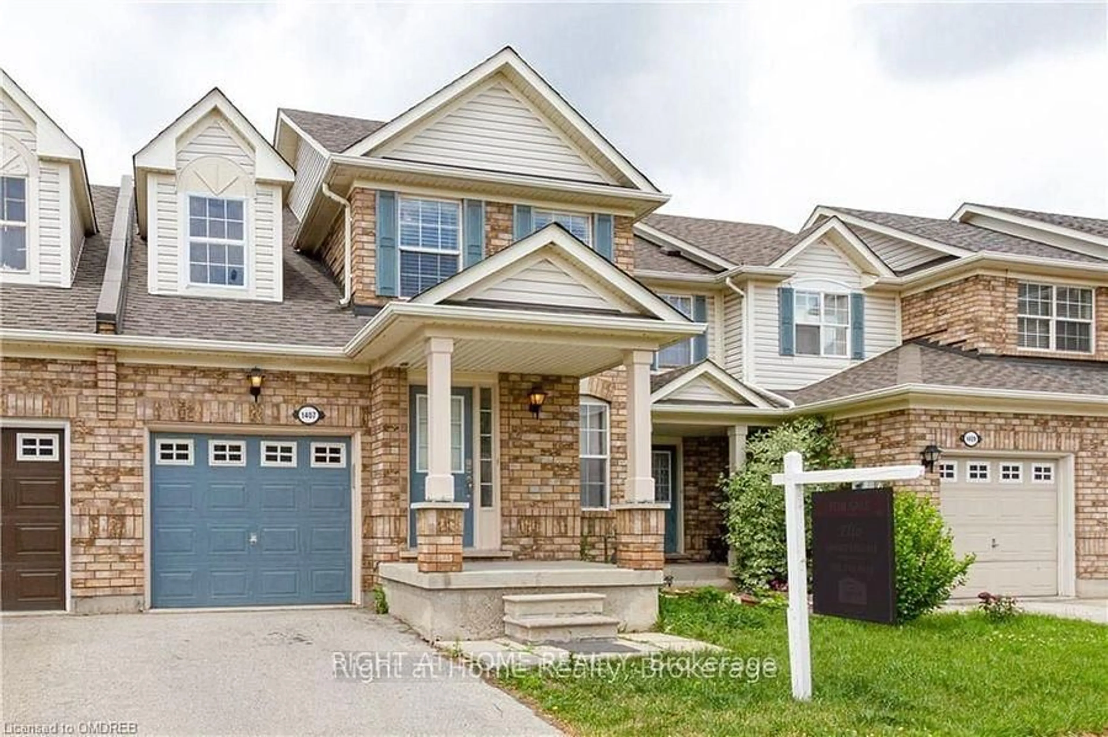 Home with brick exterior material, street for 1407 Mcdermott Way, Milton Ontario L9T 6L6