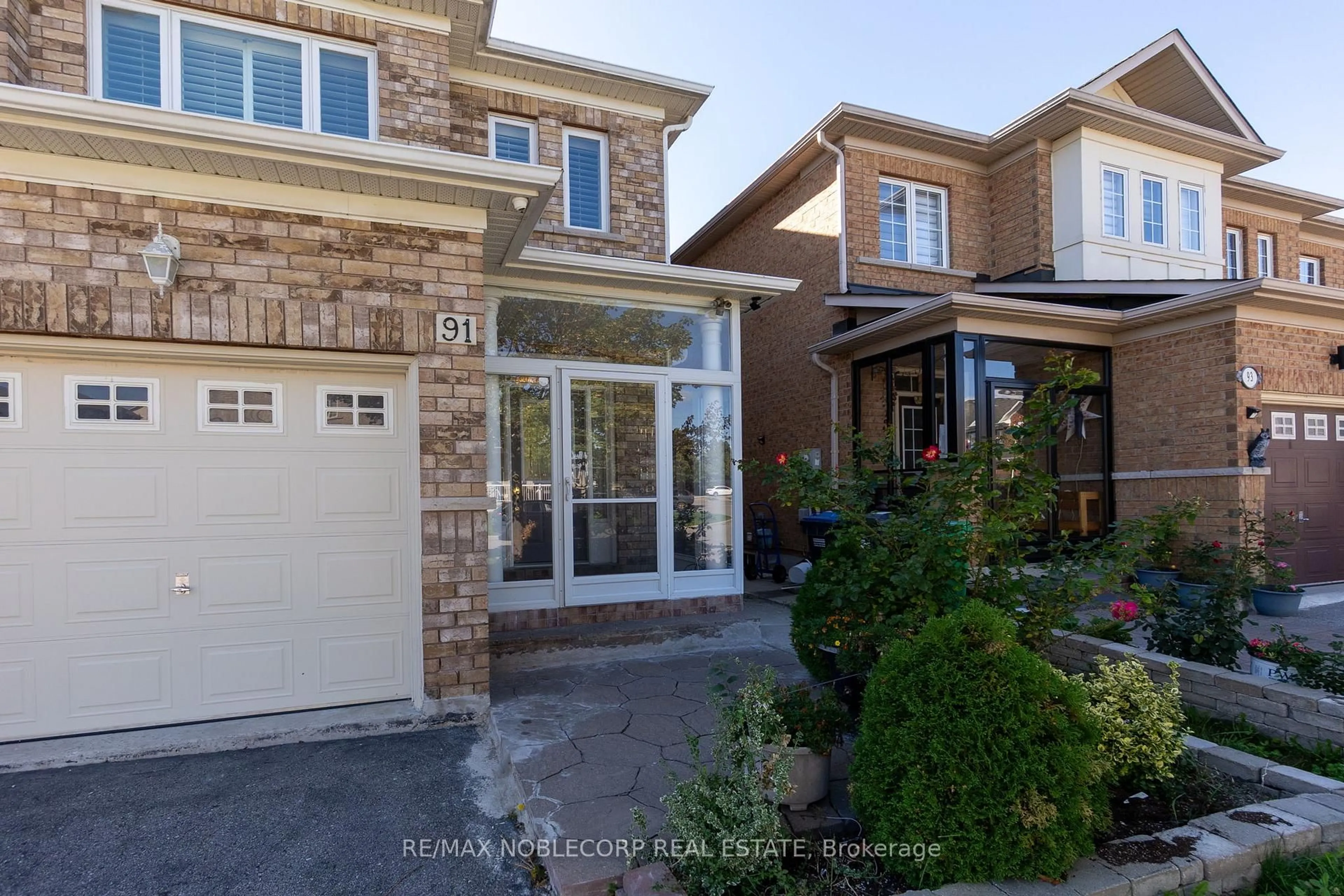 Home with brick exterior material, street for 91 Eastview Gate, Brampton Ontario L6P 2G7