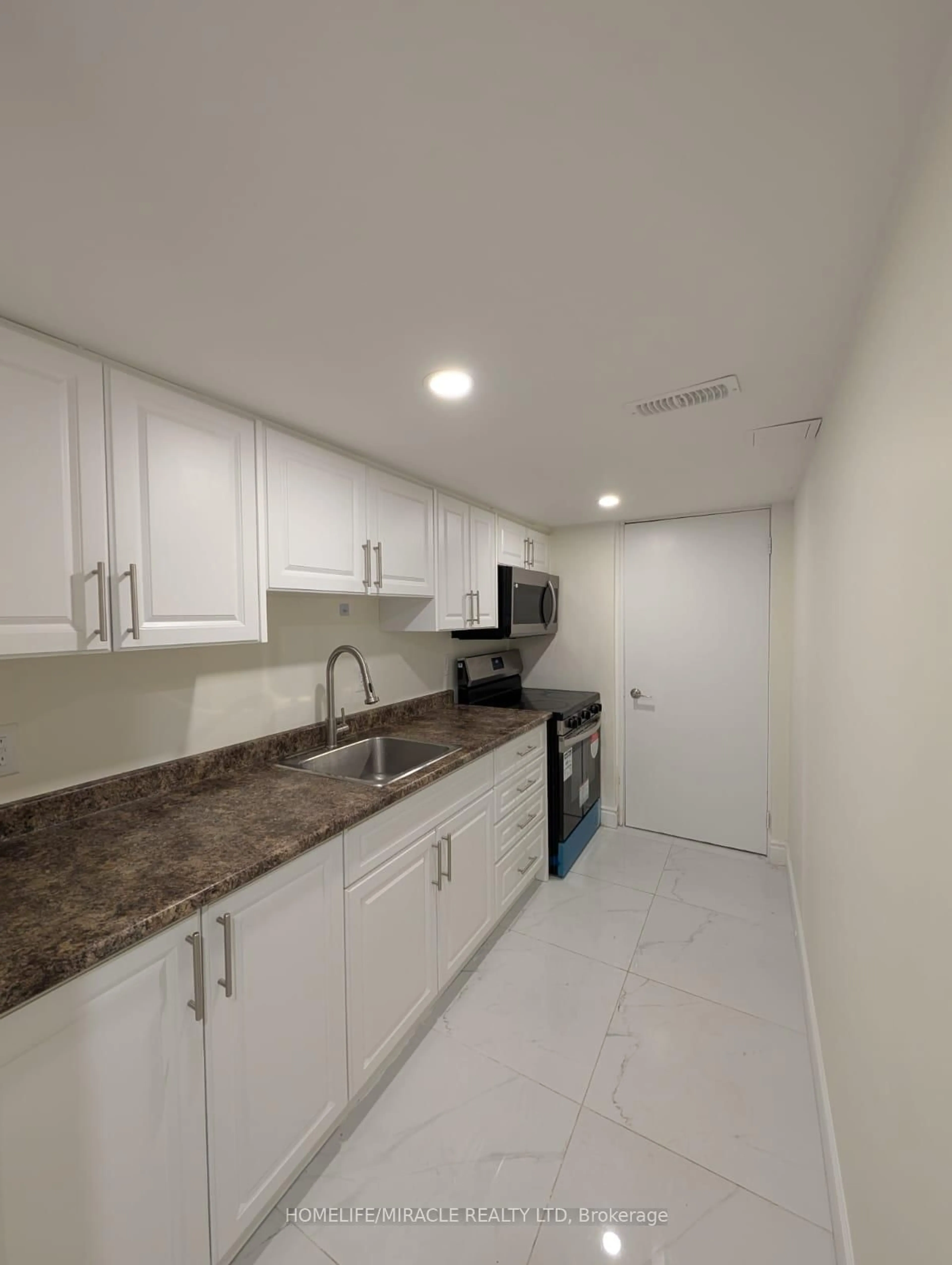 Standard kitchen, ceramic/tile floor for 37 Calm Waters Cres, Brampton Ontario L6V 4R9