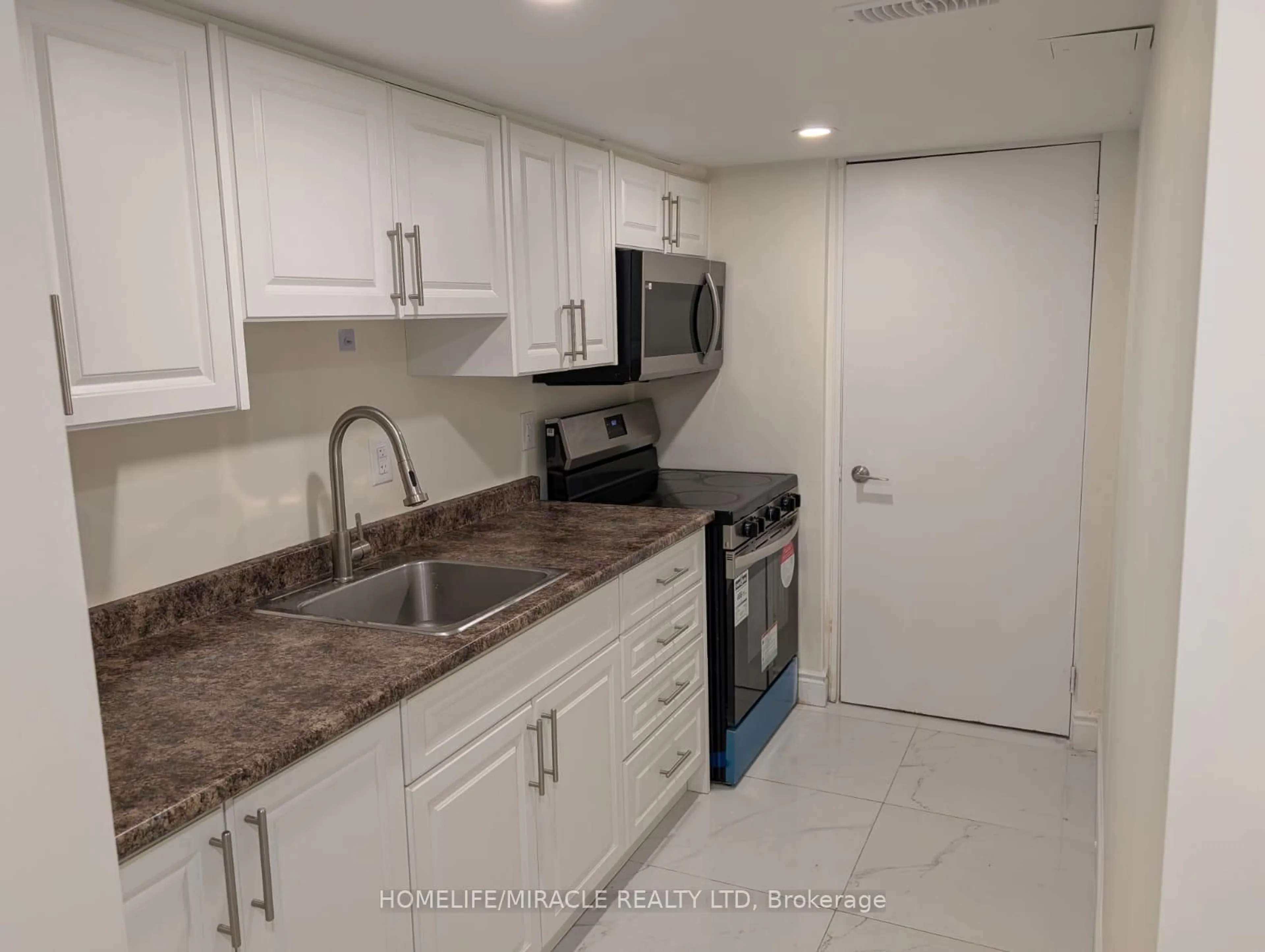 Standard kitchen, ceramic/tile floor for 37 Calm Waters Cres, Brampton Ontario L6V 4R9