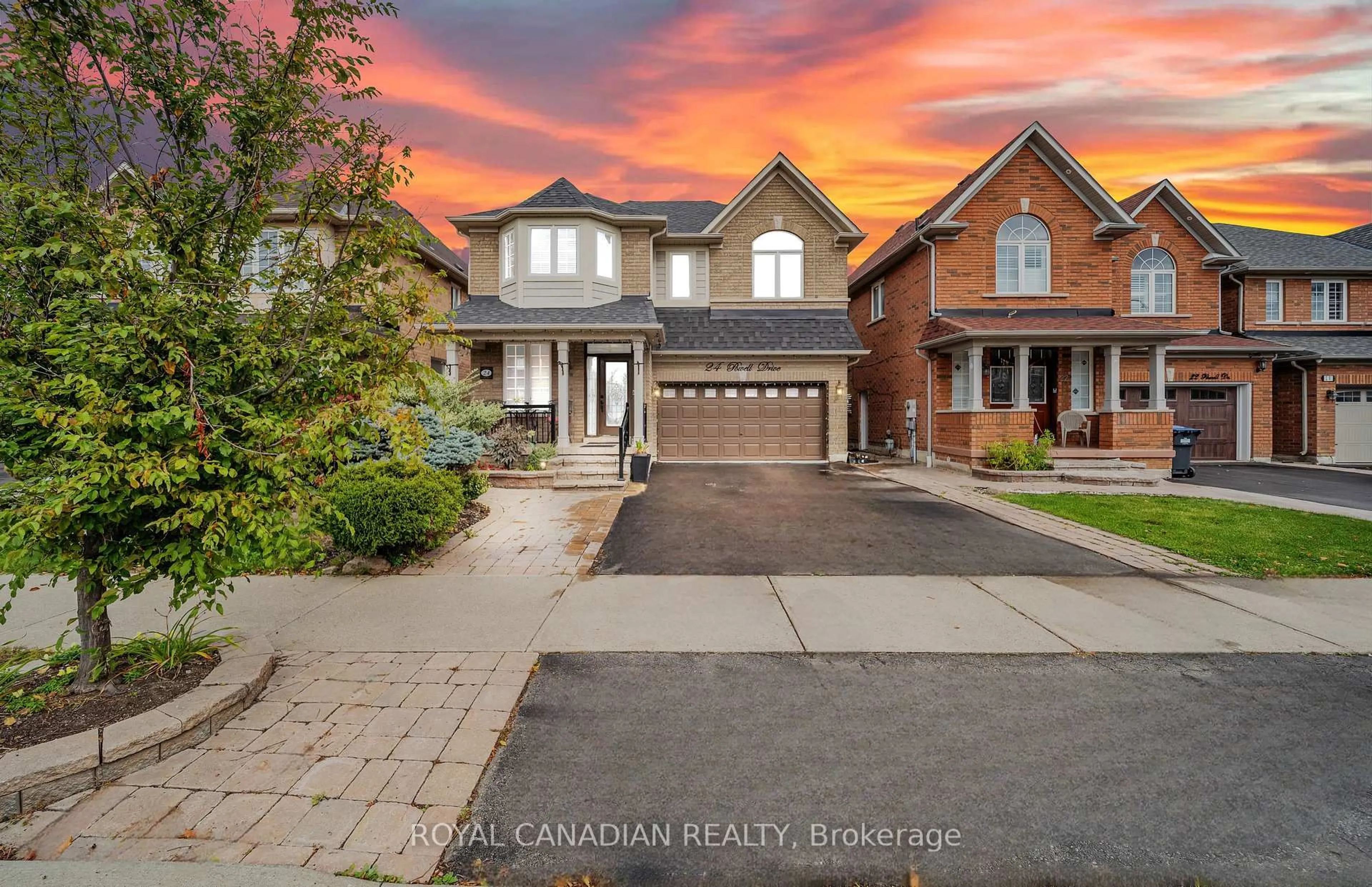 Home with brick exterior material, street for 24 Powell Dr, Brampton Ontario L6R 0L1