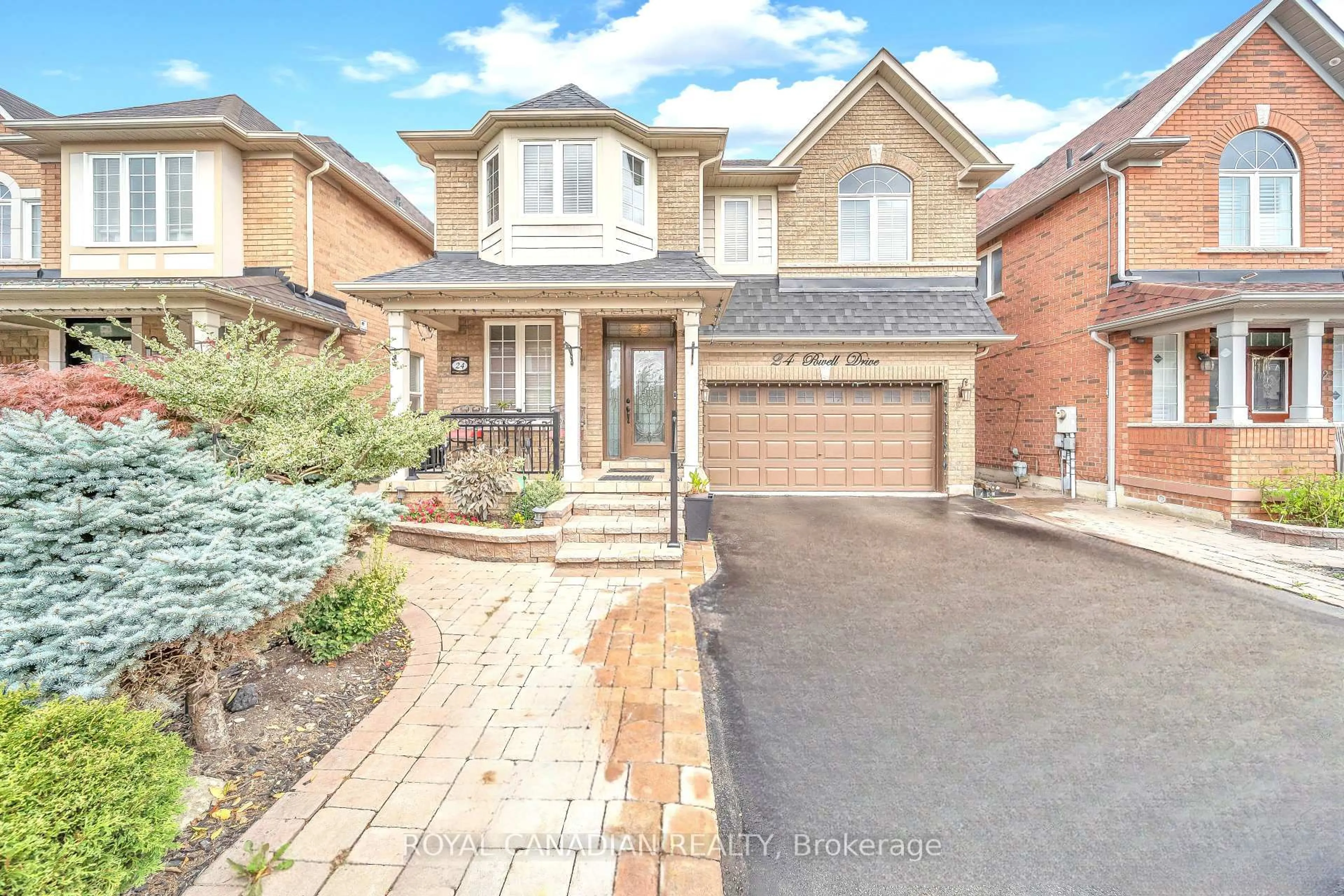 Home with brick exterior material, street for 24 Powell Dr, Brampton Ontario L6R 0L1