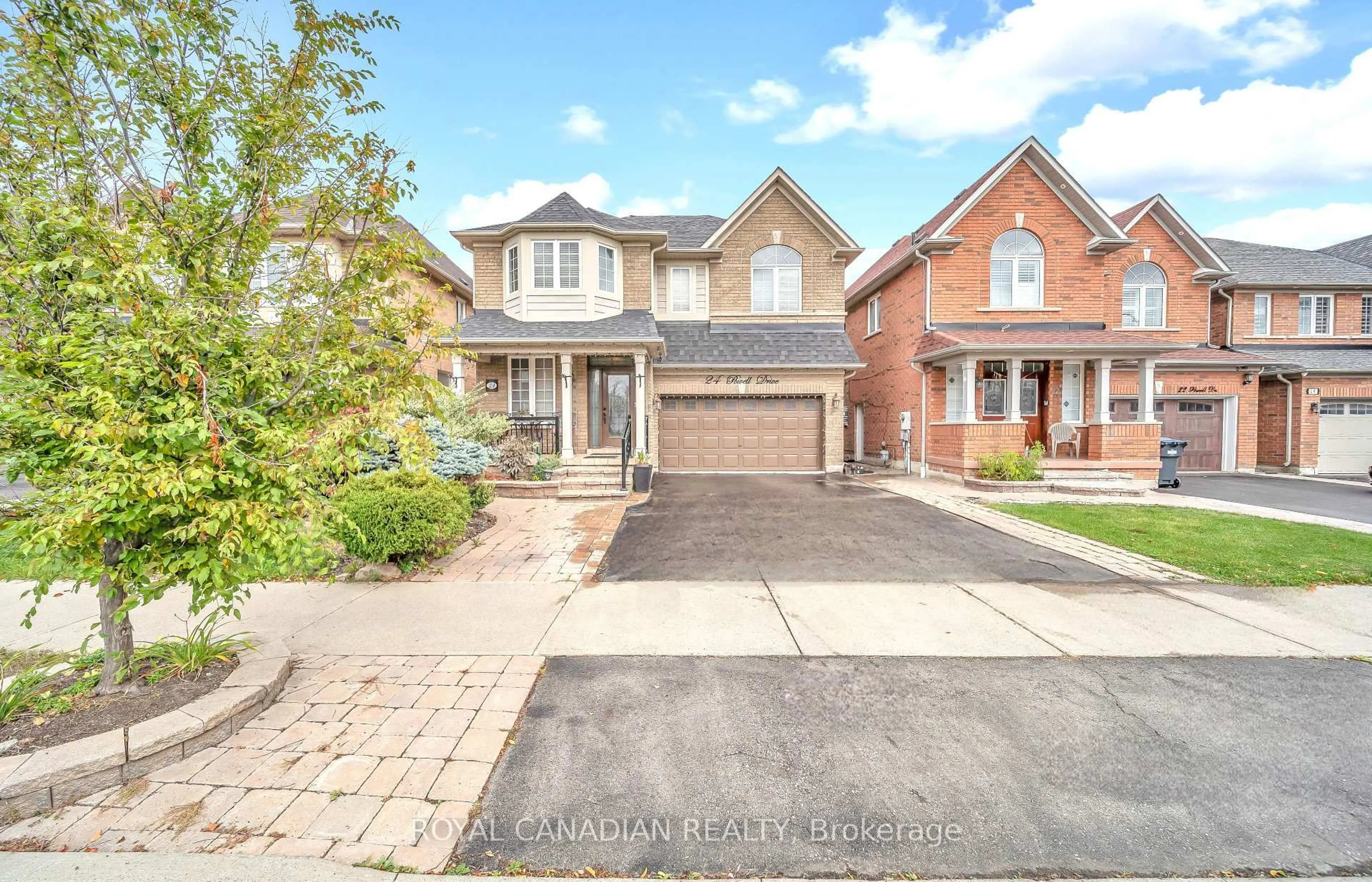 Home with brick exterior material, street for 24 Powell Dr, Brampton Ontario L6R 0L1