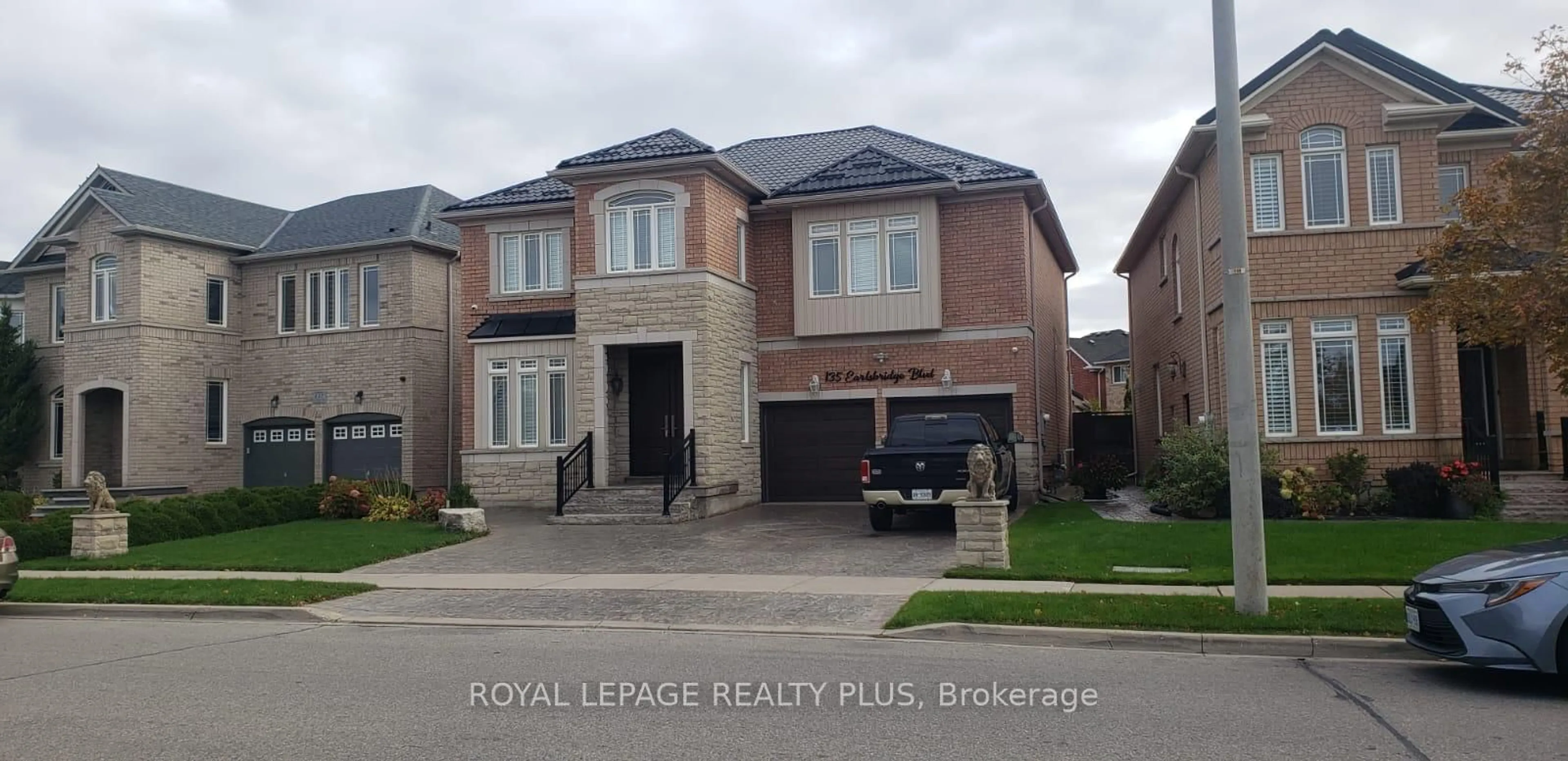 Home with brick exterior material, street for 135 Earlsbridge Blvd, Brampton Ontario L7A 3T7