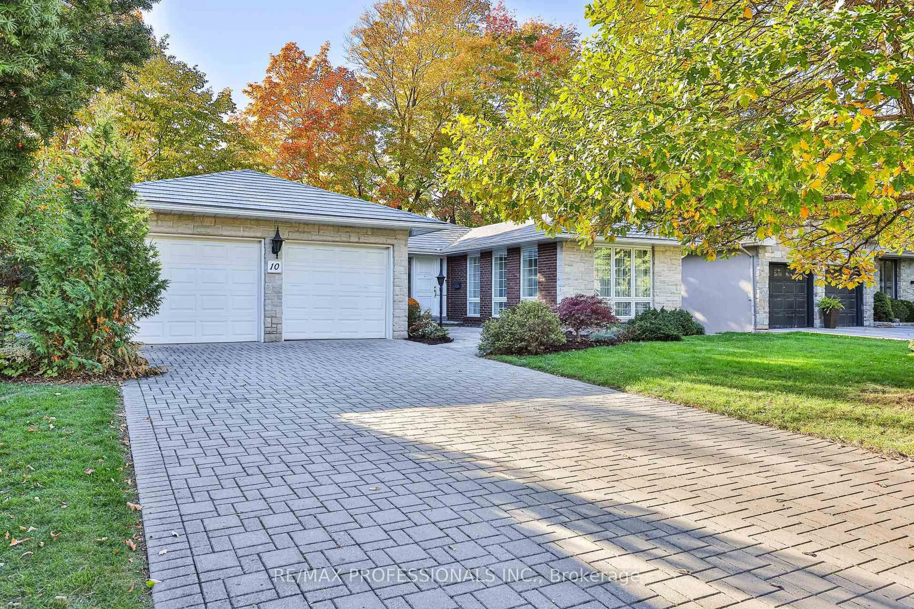 Home with brick exterior material, street for 10 Neilor Cres, Toronto Ontario M9C 1K4