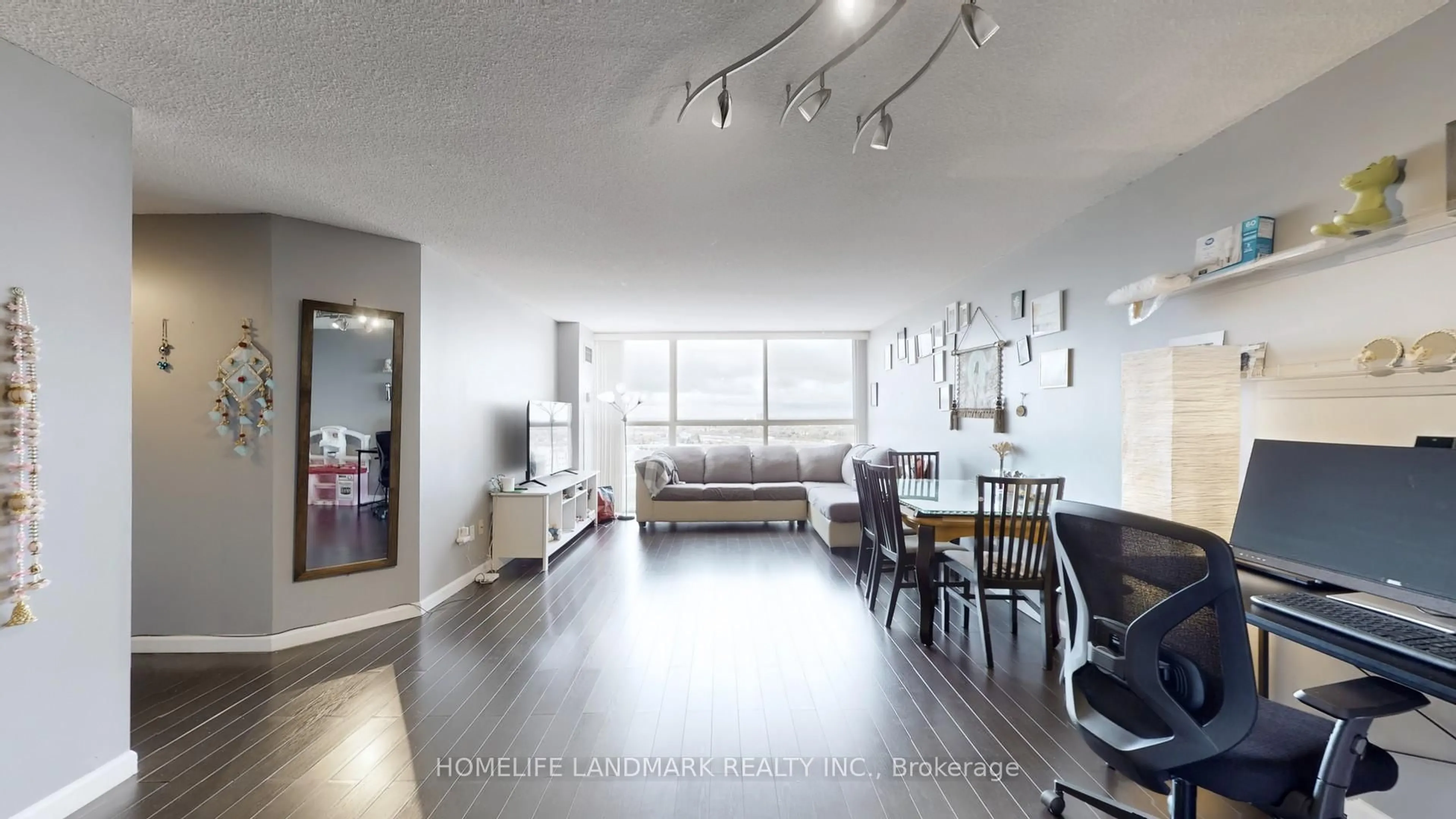 Living room with furniture, wood/laminate floor for 4185 Shipp Dr #1711, Mississauga Ontario L4Z 2Y8