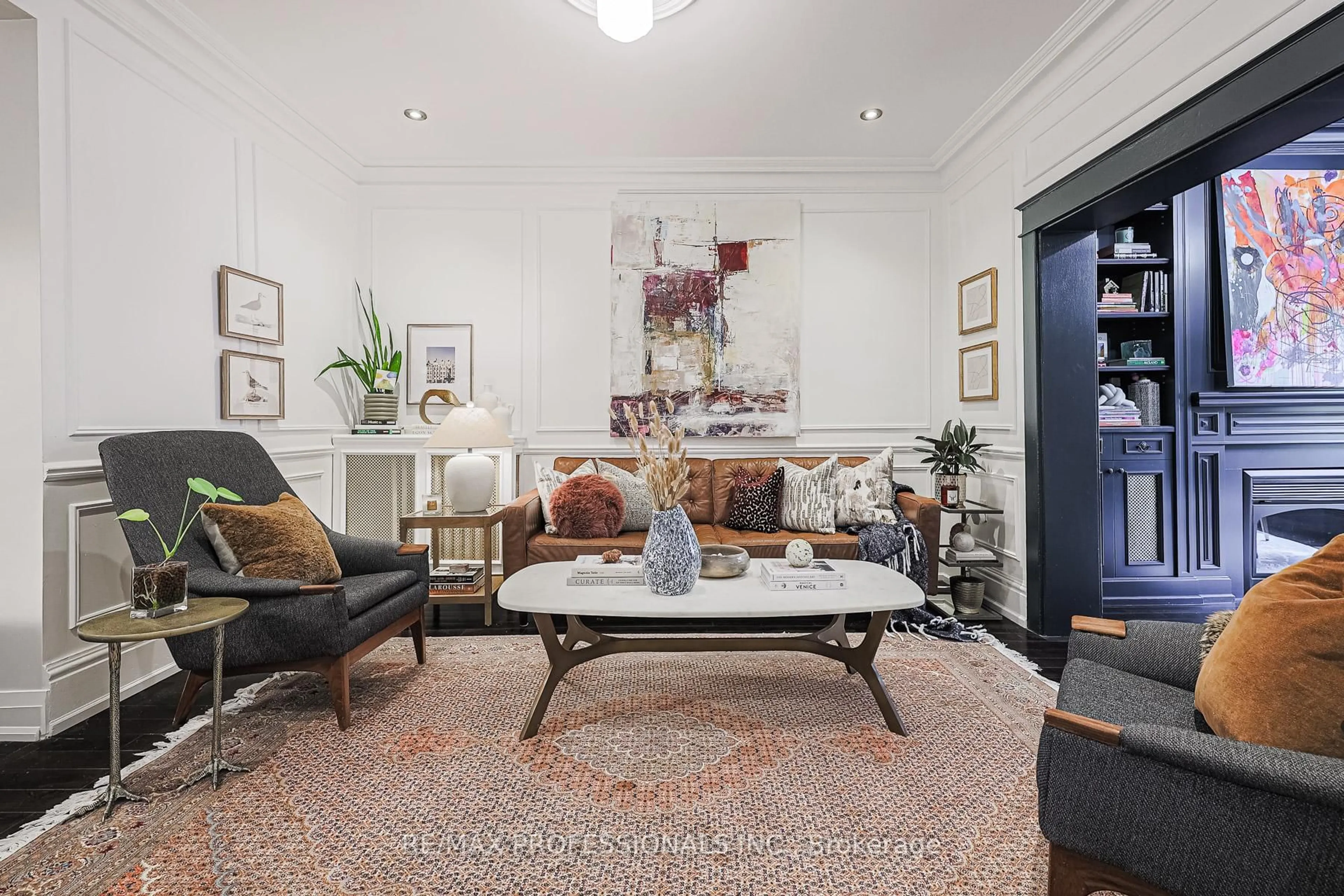 Living room with furniture, carpet floor for 18 Constance St, Toronto Ontario M6R 1S4