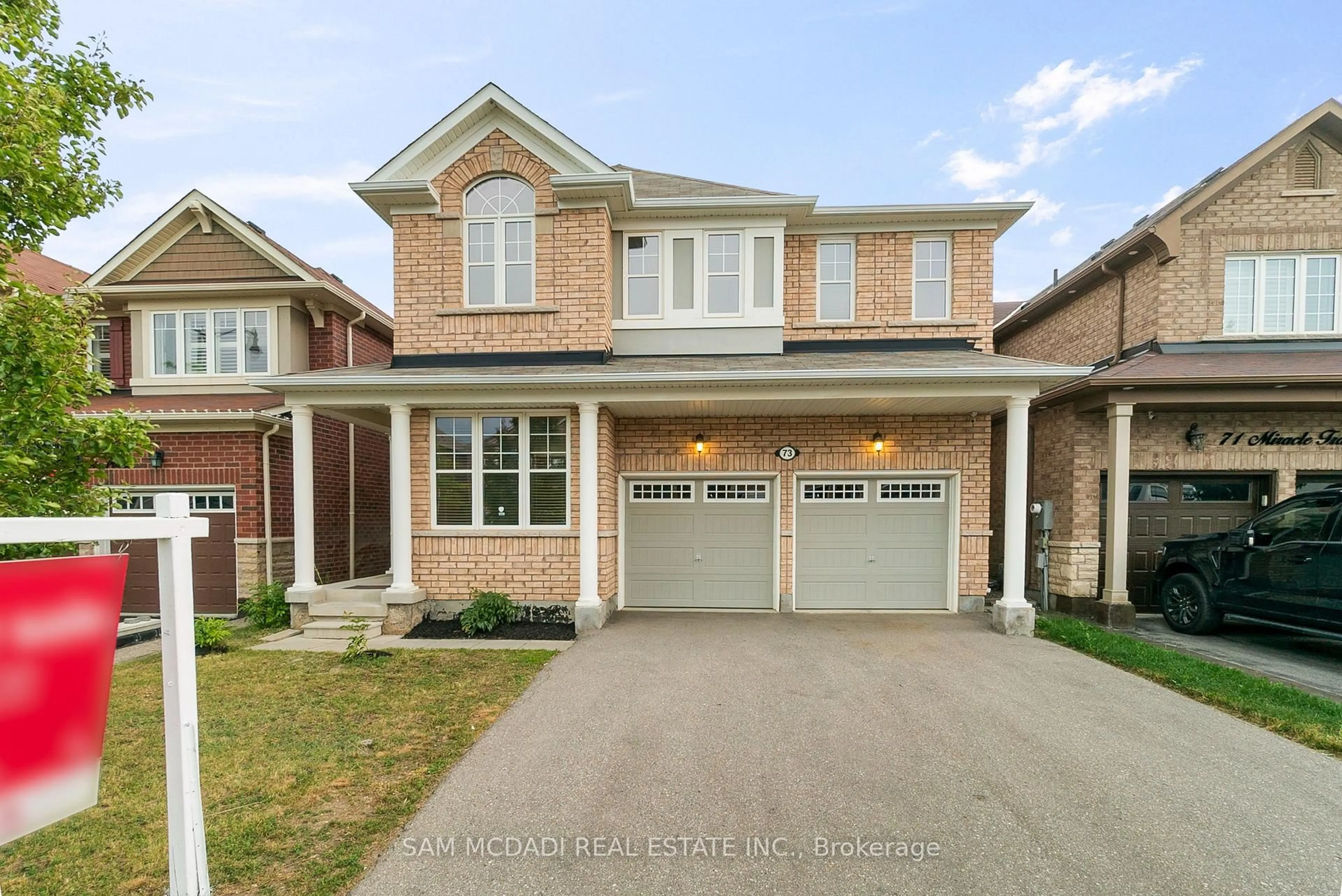 Home with brick exterior material, street for 73 Miracle Tr, Brampton Ontario L7A 0Y8