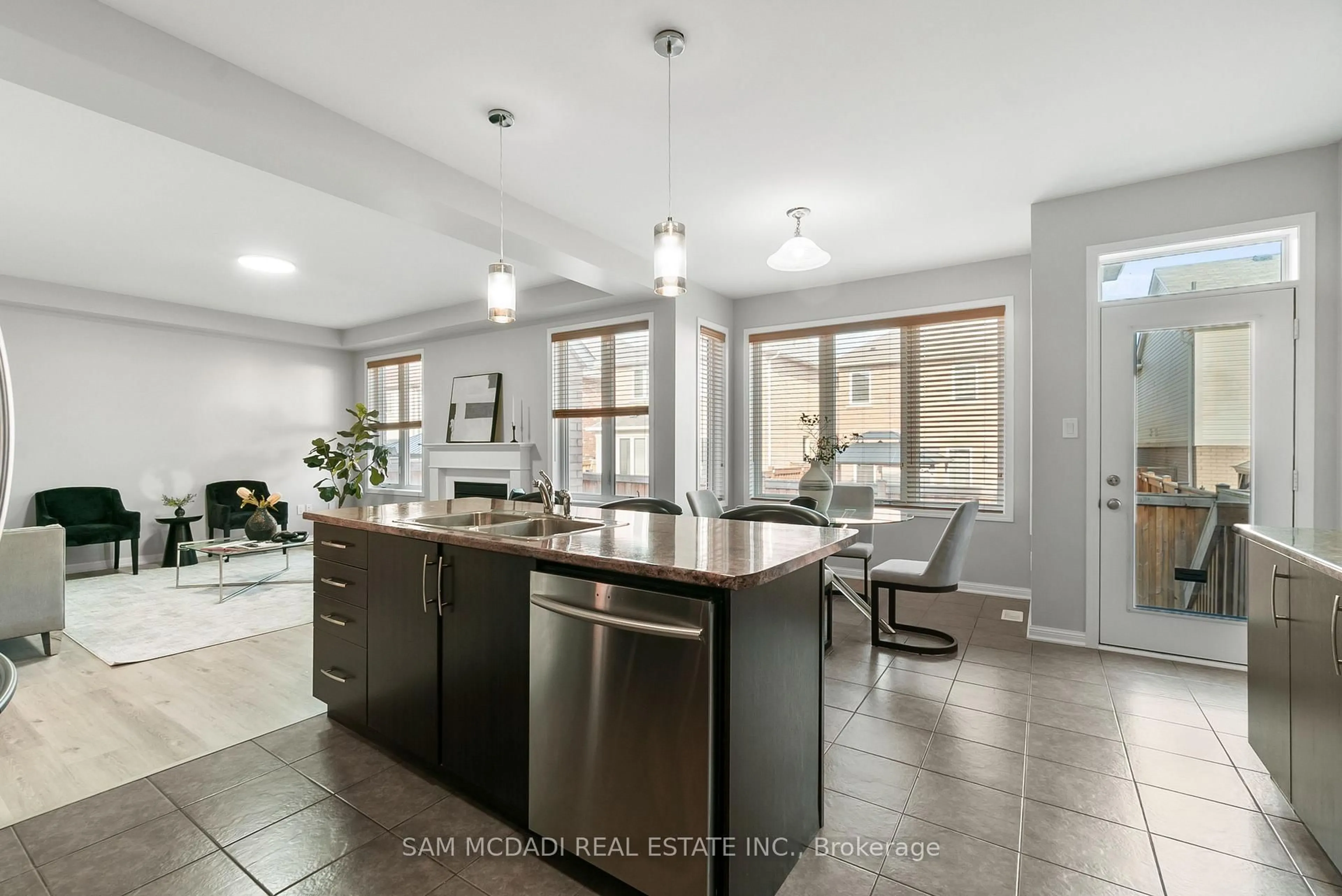 Open concept kitchen, ceramic/tile floor for 73 Miracle Tr, Brampton Ontario L7A 0Y8