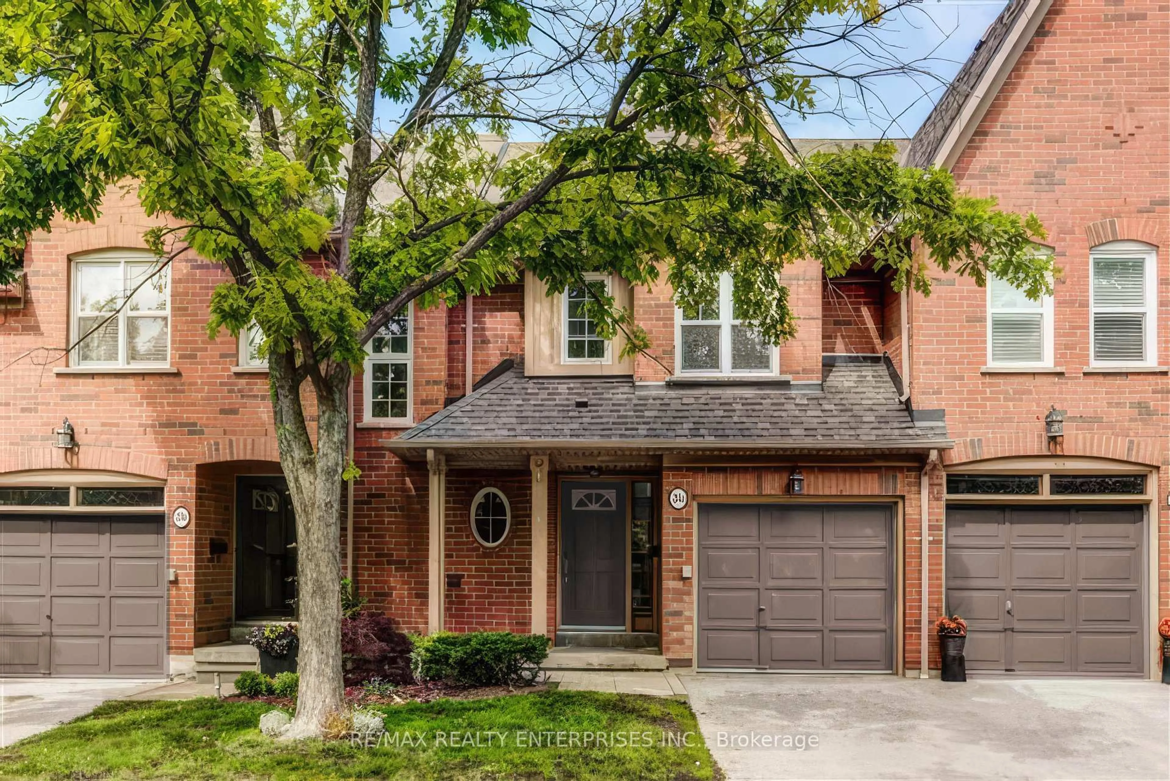 Home with brick exterior material, street for 1084 Queen St #24B, Mississauga Ontario L5H 4K4