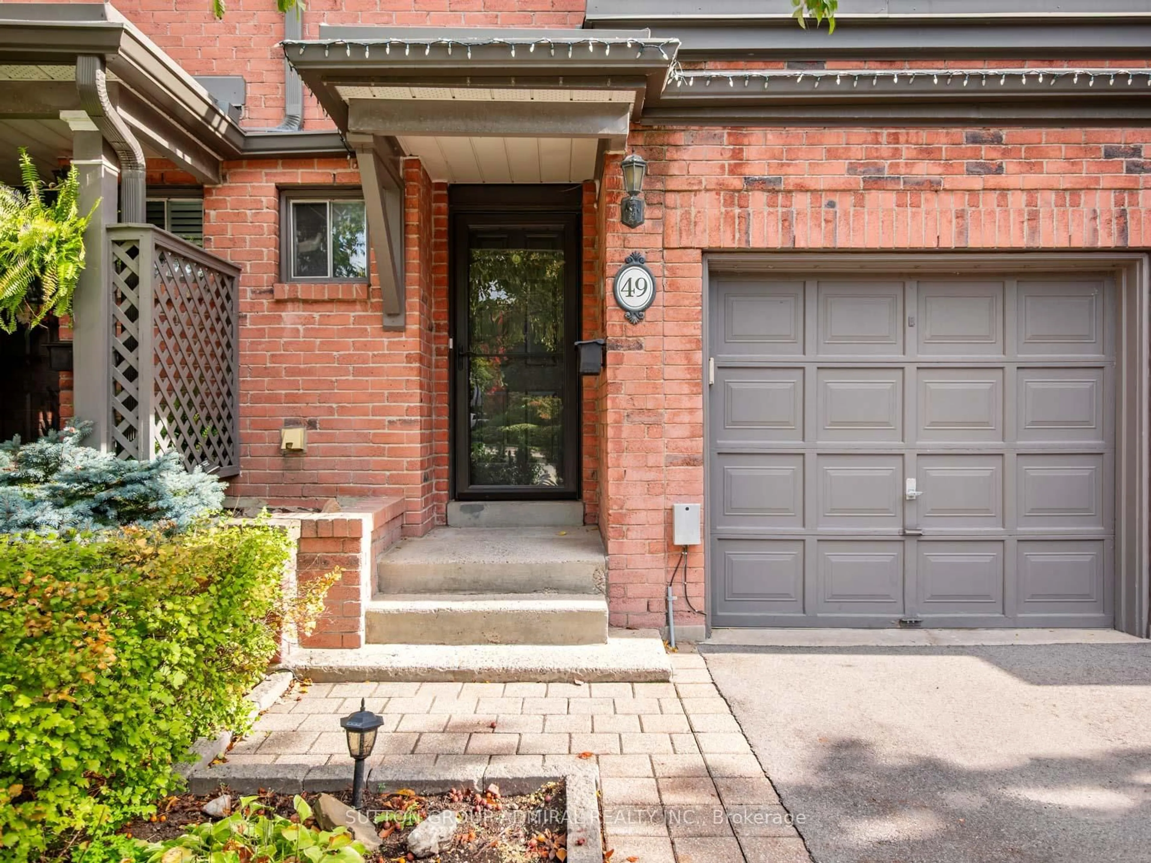 Home with brick exterior material, street for 385 The East Mall #49, Toronto Ontario M9B 6J4