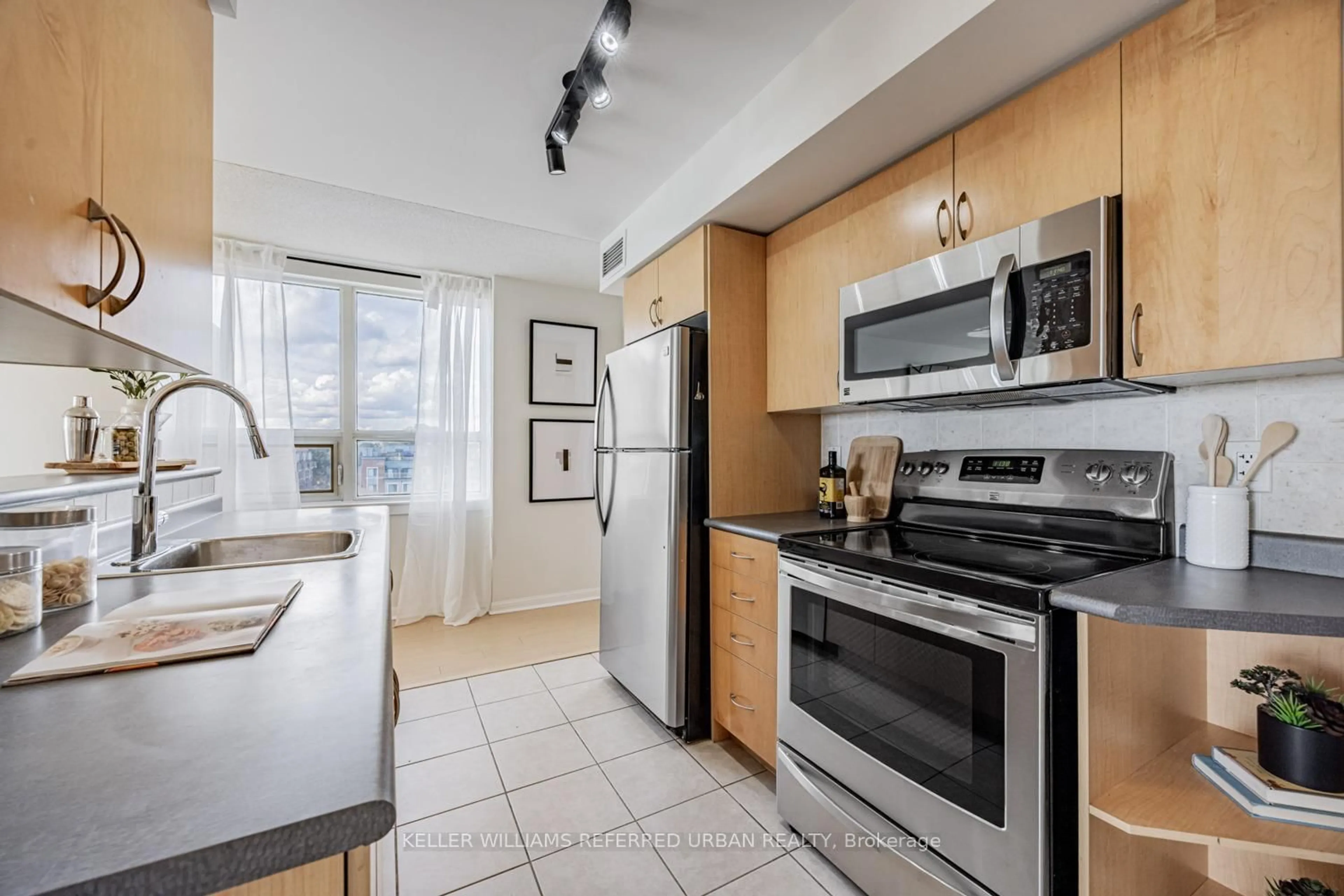Standard kitchen, ceramic/tile floor for 4 Elsinore Path #511, Toronto Ontario M8V 4G7