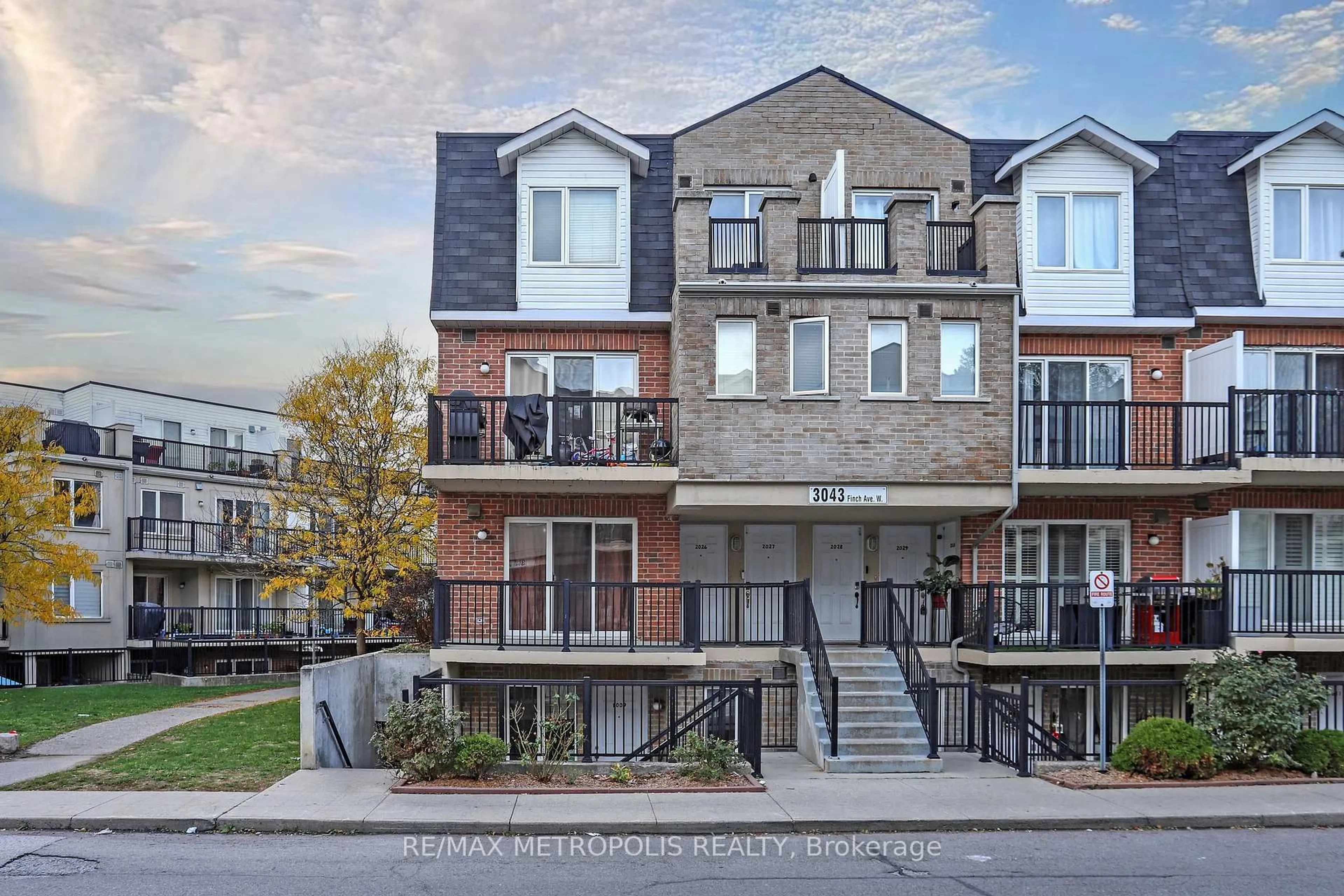 Home with brick exterior material, street for 3043 Finch Ave #2025, Toronto Ontario M9M 0A4