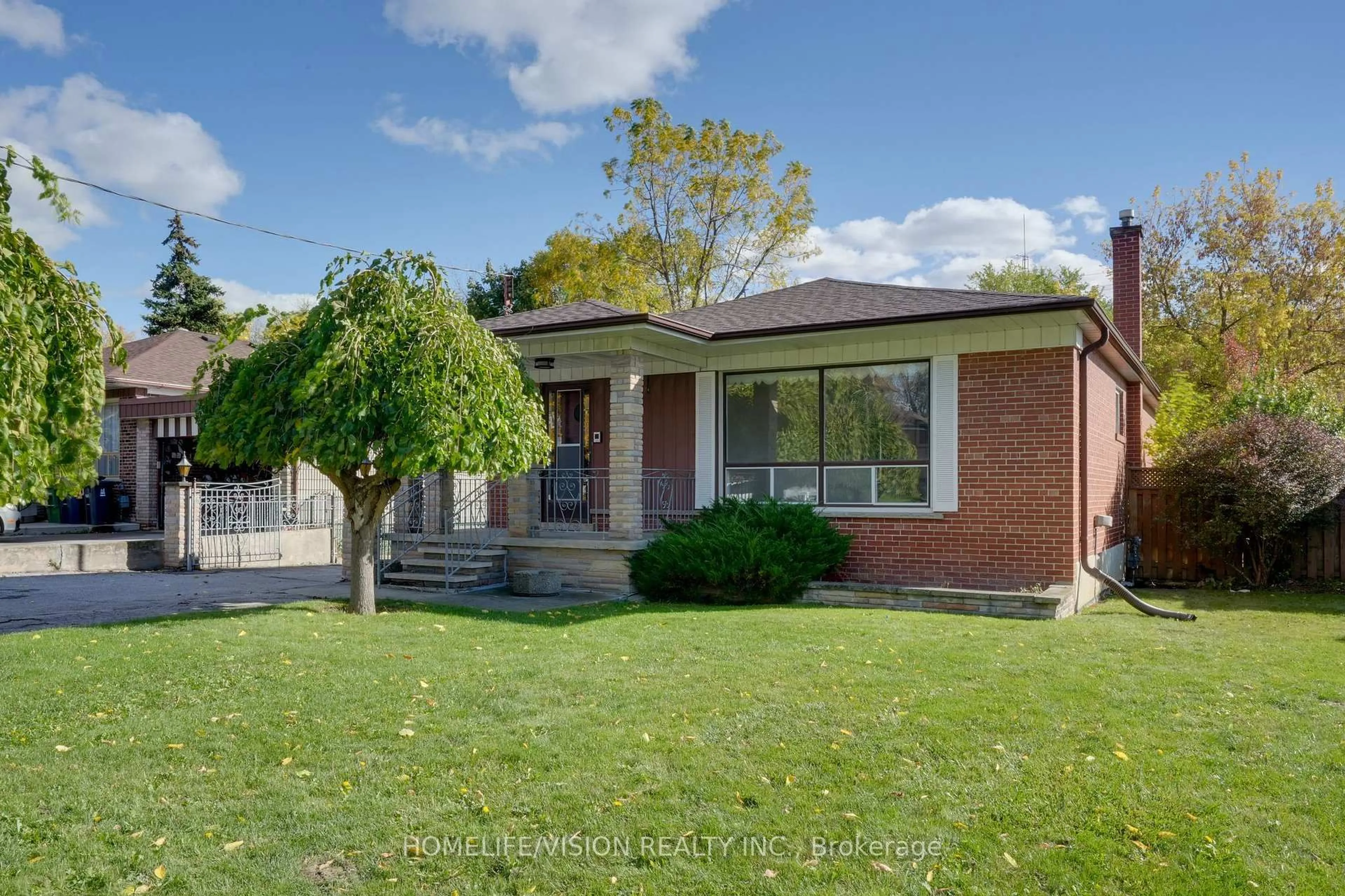 Home with brick exterior material, street for 239 Epsom Downs Dr, Toronto Ontario M3M 1T3
