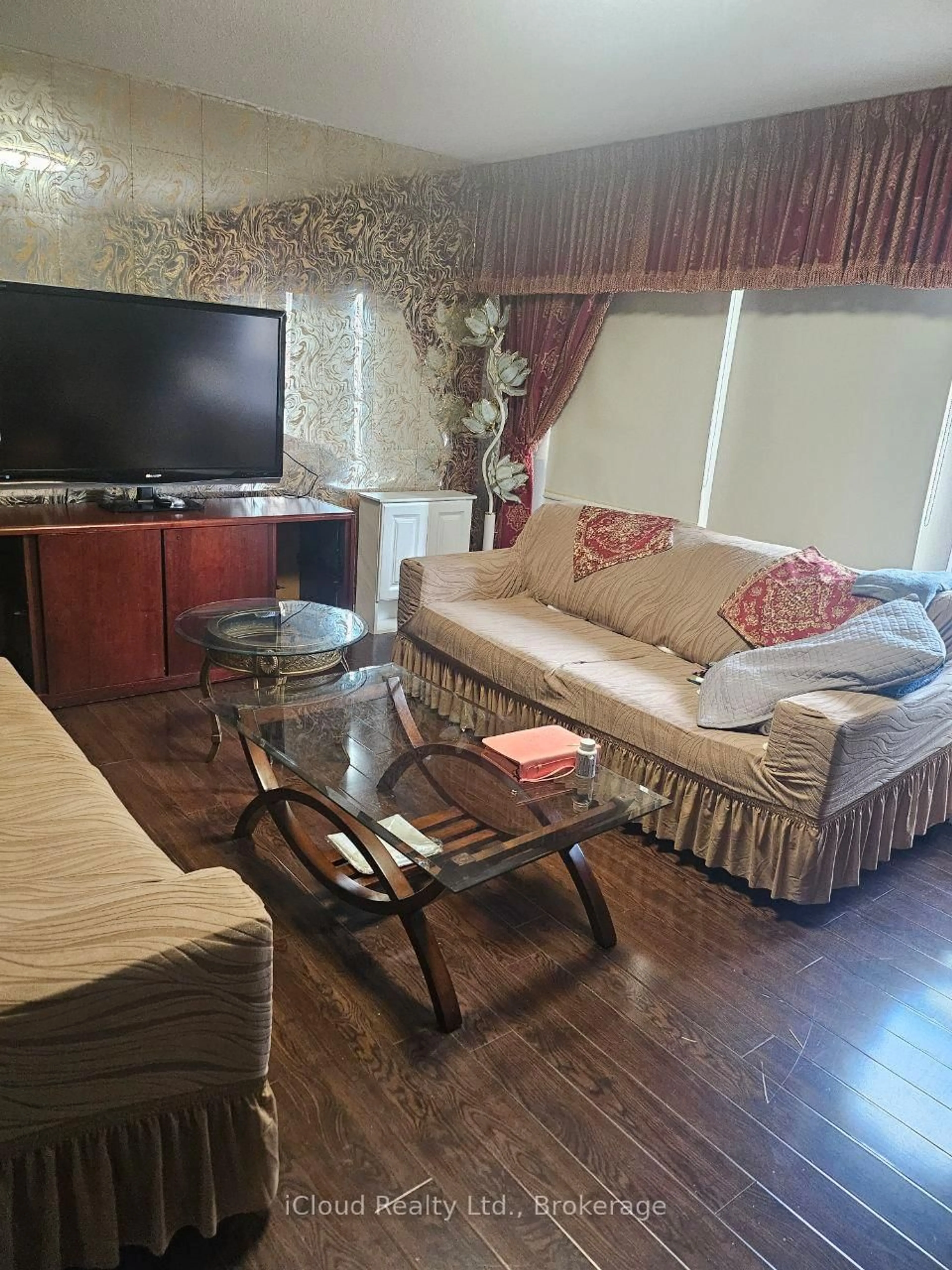 Living room with furniture, wood/laminate floor for 6448 Finch Ave #182, Toronto Ontario M9V 1T4