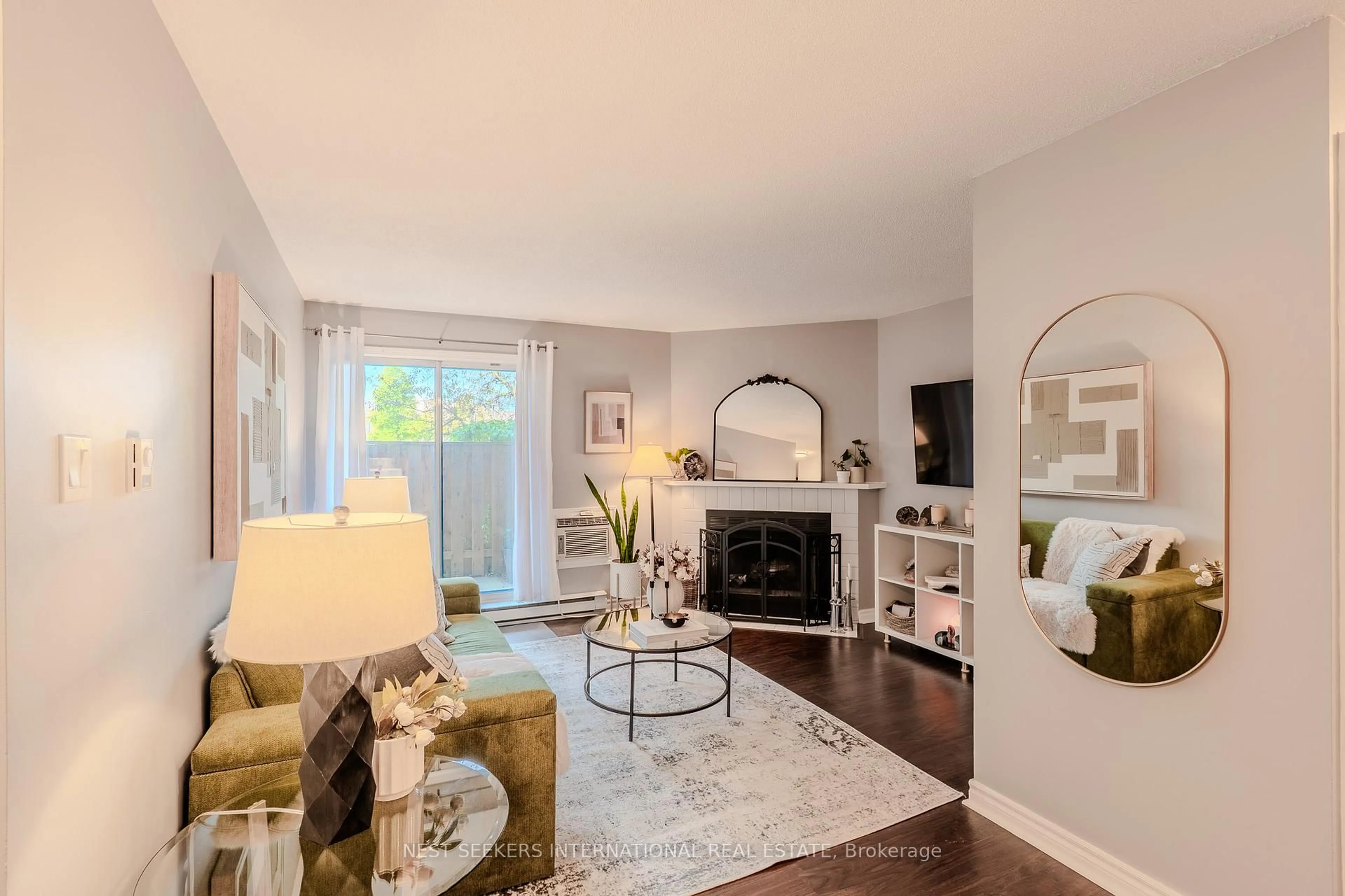Living room with furniture, unknown for 95 Trailwood Dr #711, Mississauga Ontario L4Z 3L2