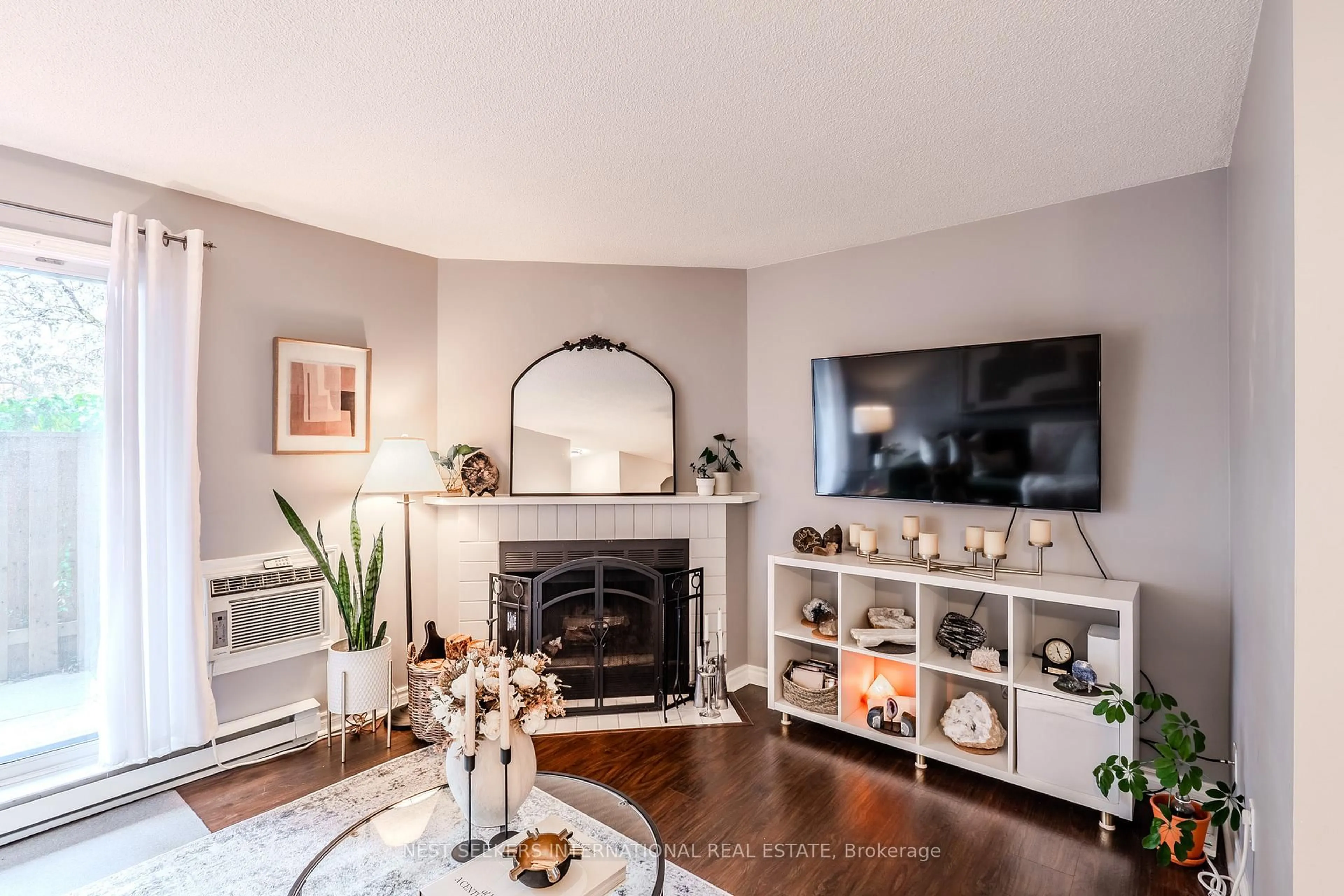 Living room with furniture, unknown for 95 Trailwood Dr #711, Mississauga Ontario L4Z 3L2