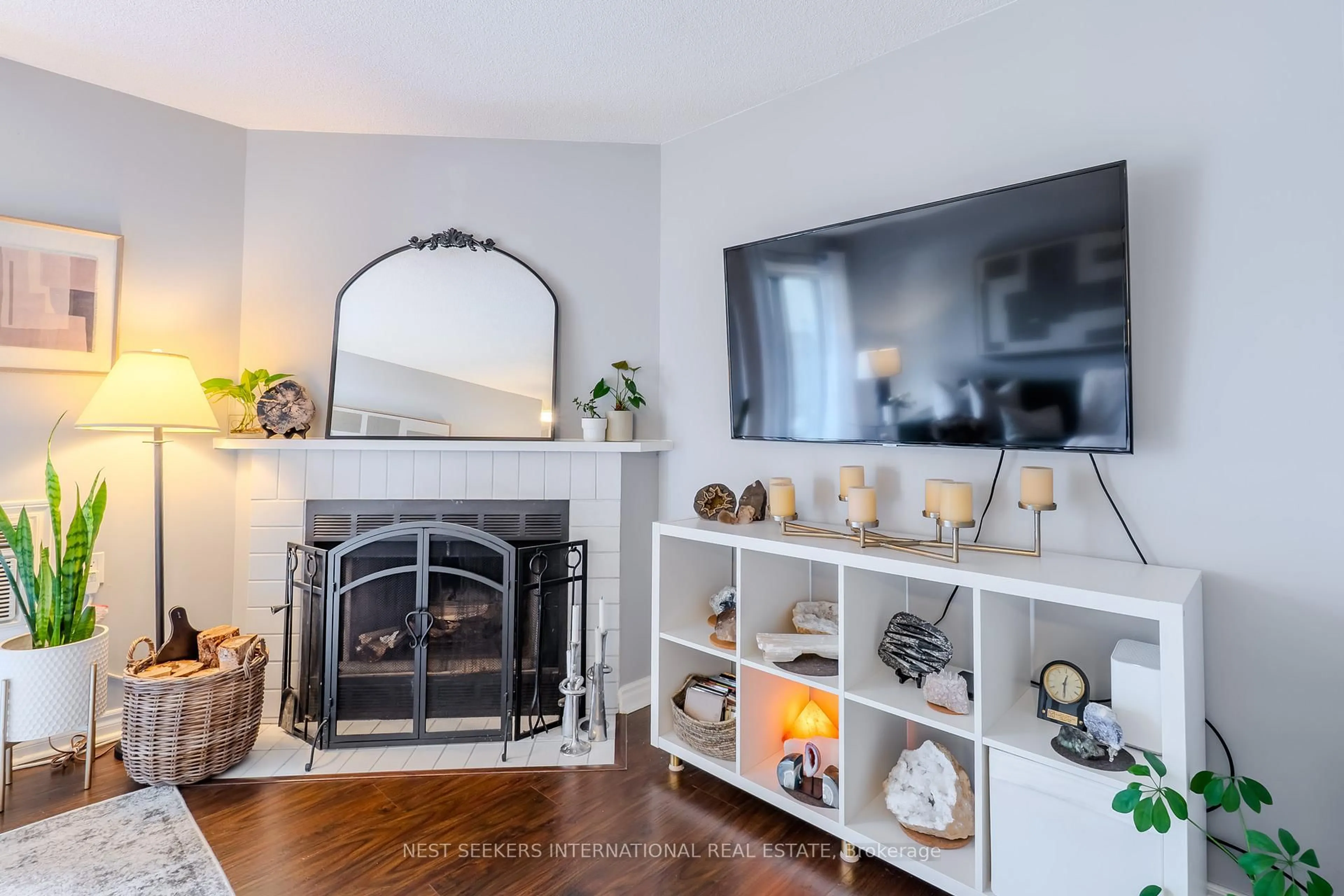 Living room with furniture, ceramic/tile floor for 95 Trailwood Dr #711, Mississauga Ontario L4Z 3L2