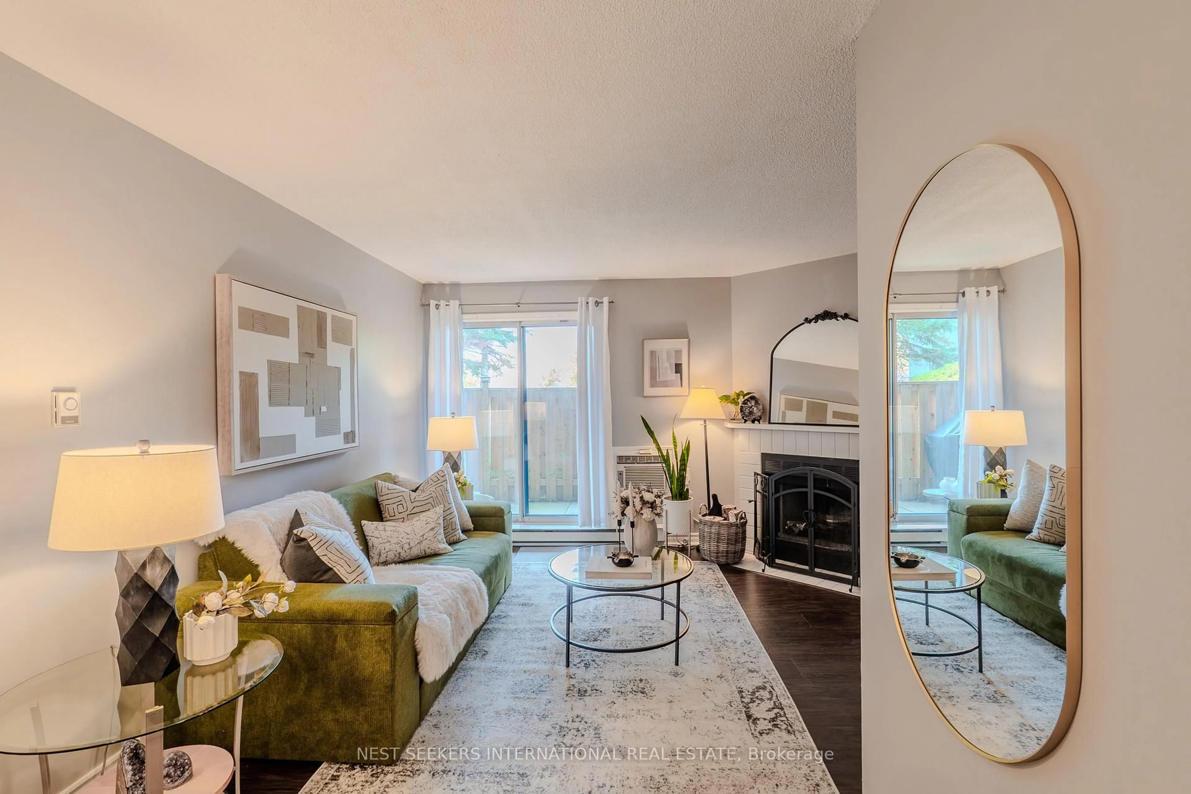 Living room with furniture, unknown for 95 Trailwood Dr #711, Mississauga Ontario L4Z 3L2