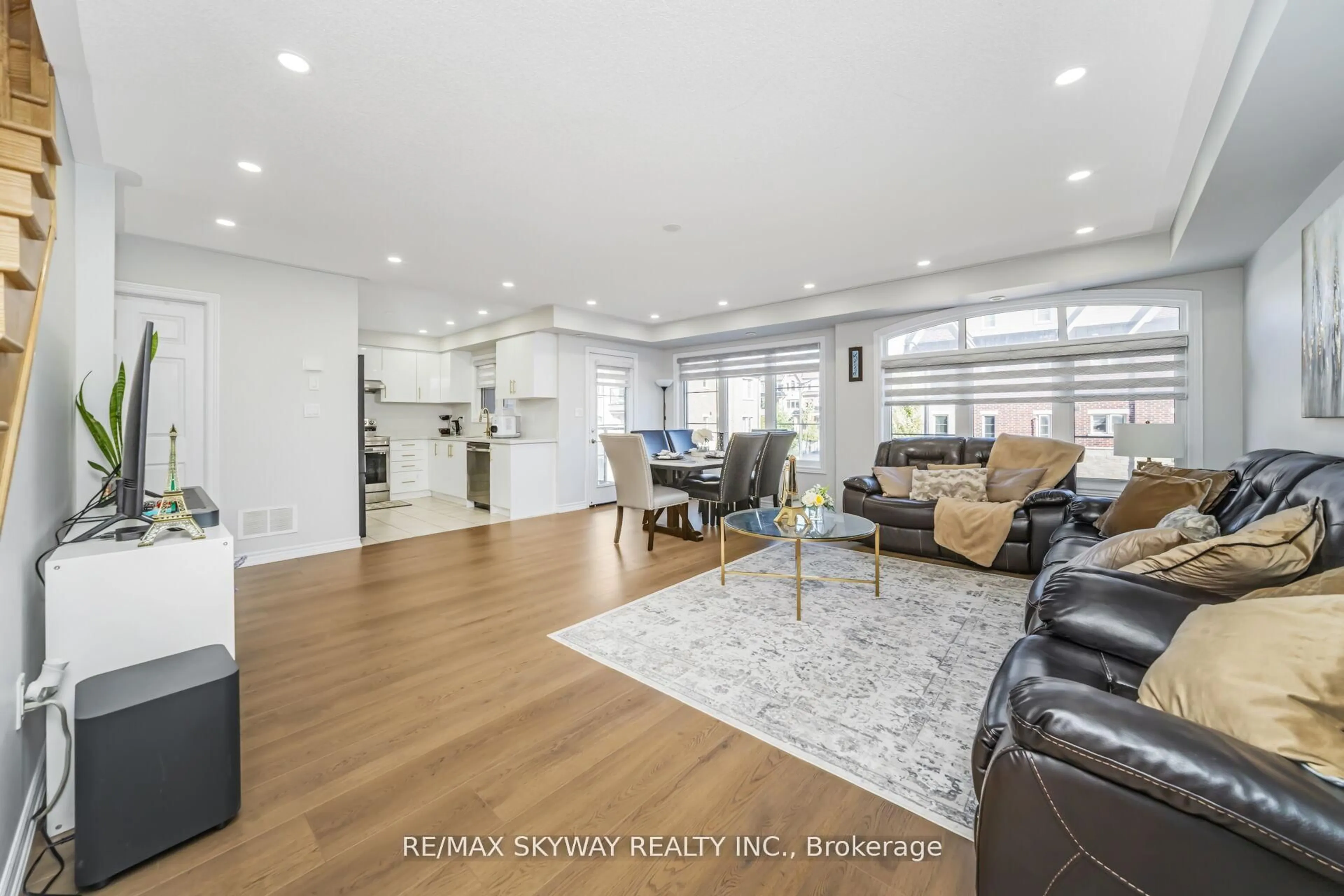 Living room with furniture, wood/laminate floor for 200 Veterans Dr #22, Brampton Ontario L7A 4S6