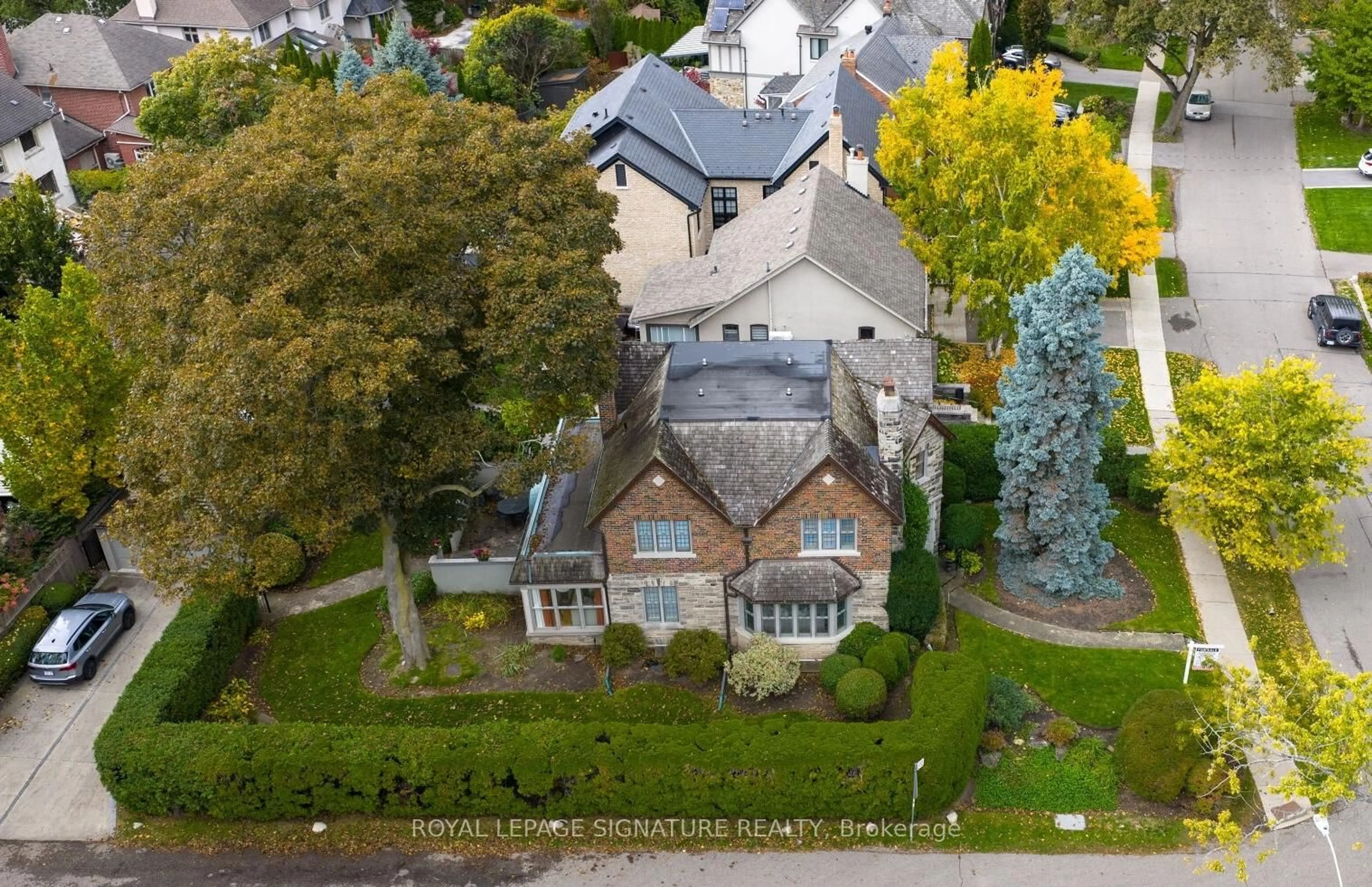 A pic from outside/outdoor area/front of a property/back of a property/a pic from drone, street for 51 Strath Ave, Toronto Ontario M8X 1R4