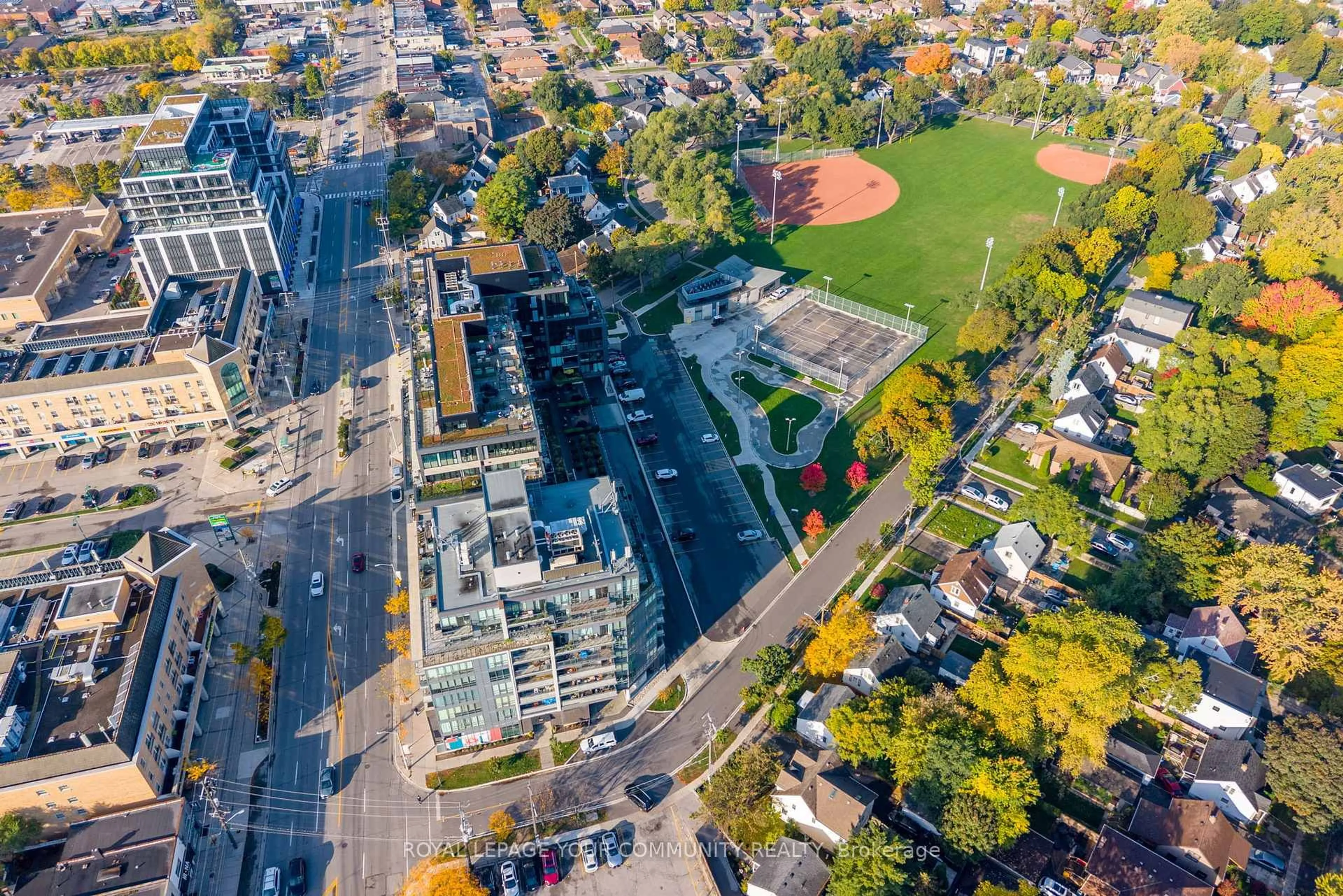 A pic from outside/outdoor area/front of a property/back of a property/a pic from drone, street for 7 Smith Cres #325, Toronto Ontario M8Z 0G3