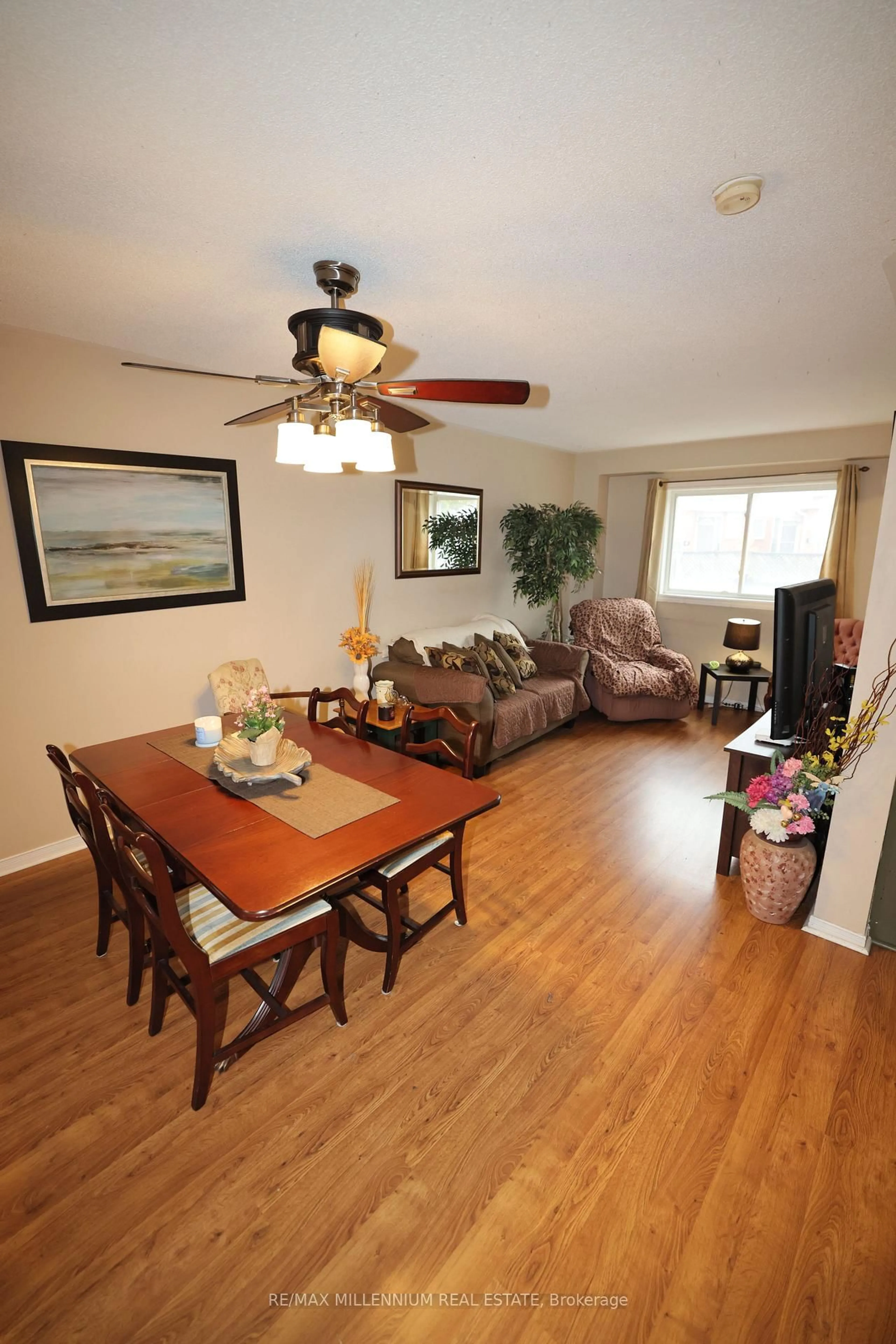 Living room with furniture, wood/laminate floor for 4 Stewart Maclaren Rd, Halton Hills Ontario L7G 5L8