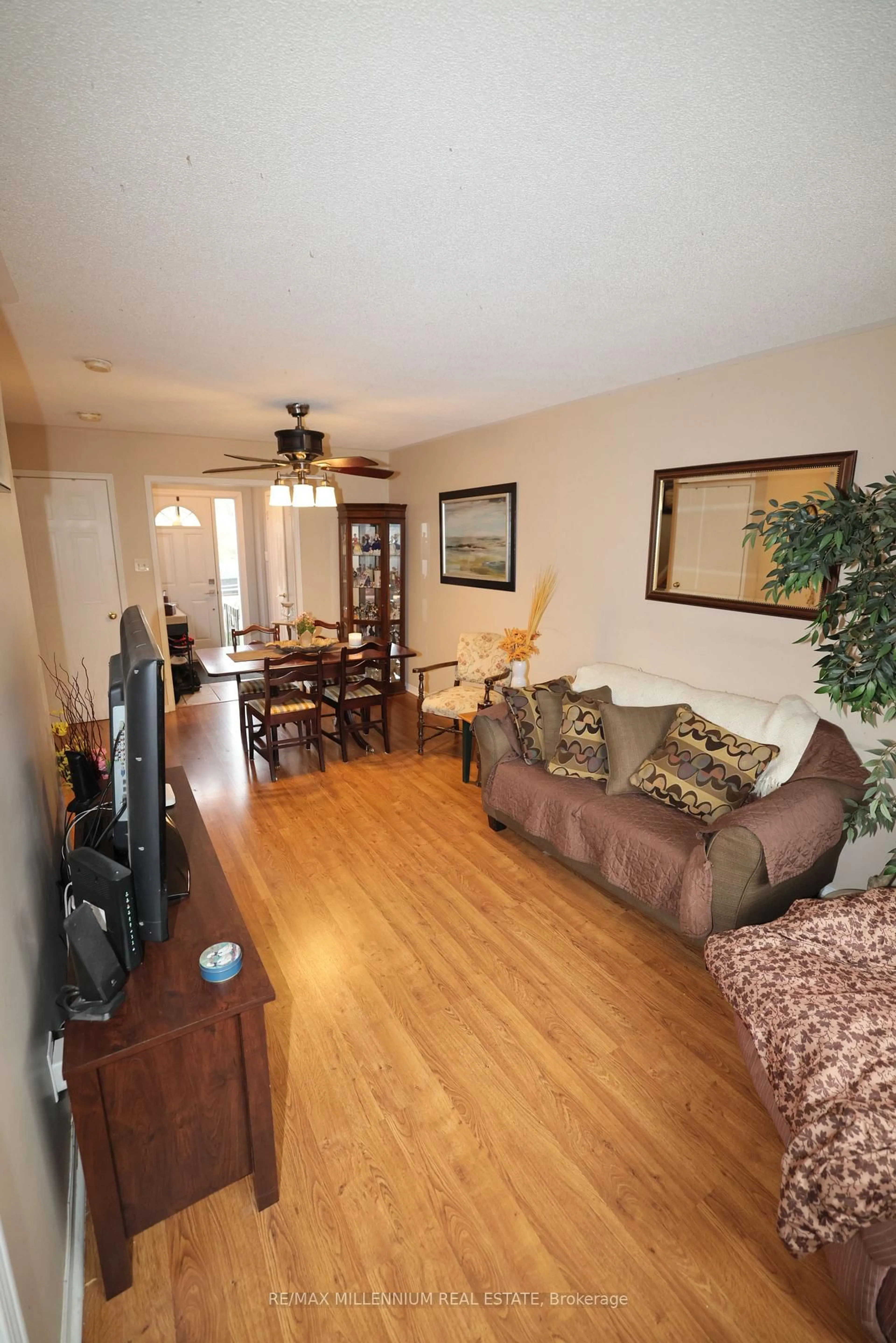 Living room with furniture, wood/laminate floor for 4 Stewart Maclaren Rd, Halton Hills Ontario L7G 5L8