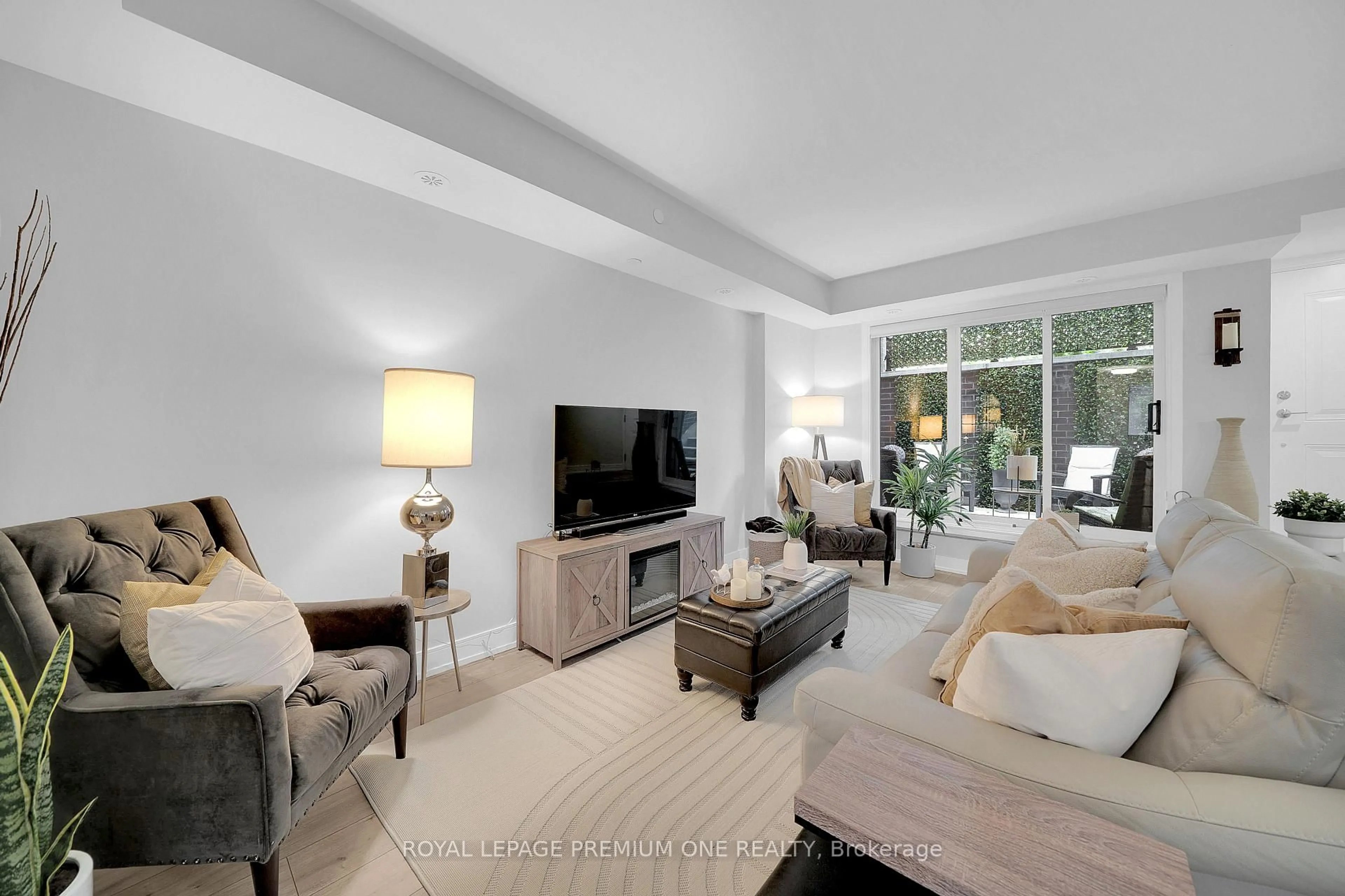 Living room with furniture, unknown for 66 Long Branch Ave #13, Toronto Ontario M8W 3J4