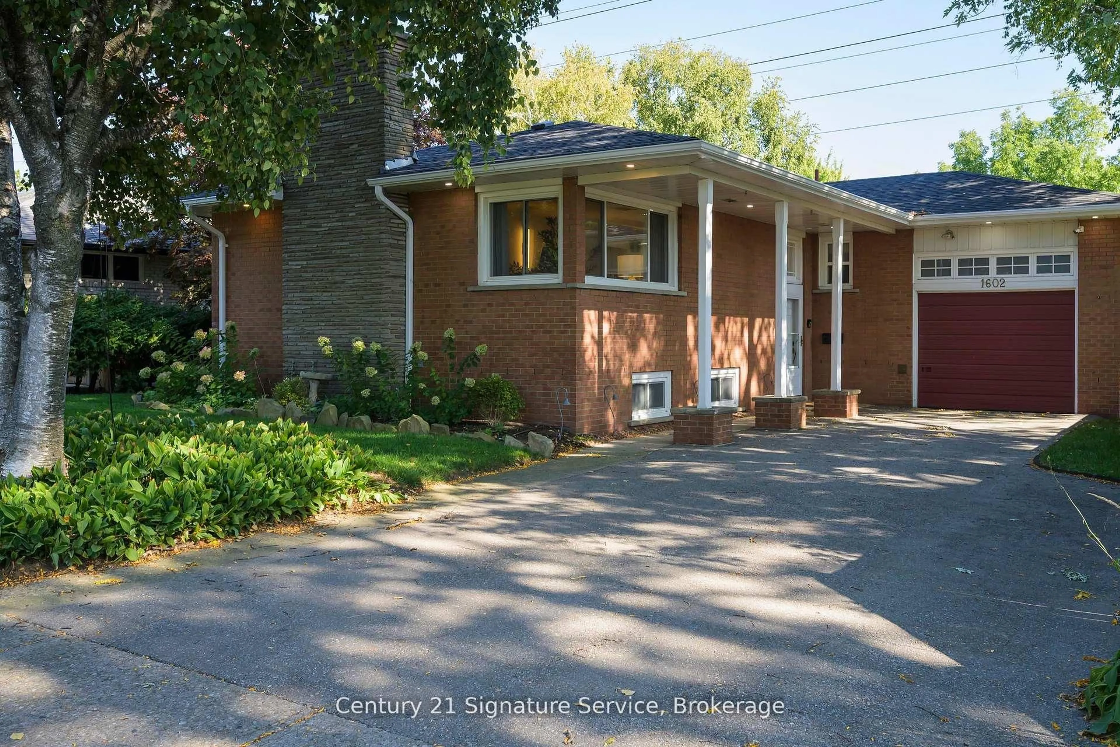 Home with brick exterior material, street for 1602 Carletta Dr, Mississauga Ontario L4X 1E5